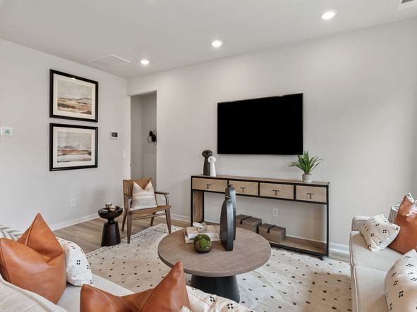Watch the big game with friends or enjoy your favorite movie in the cozy great room.