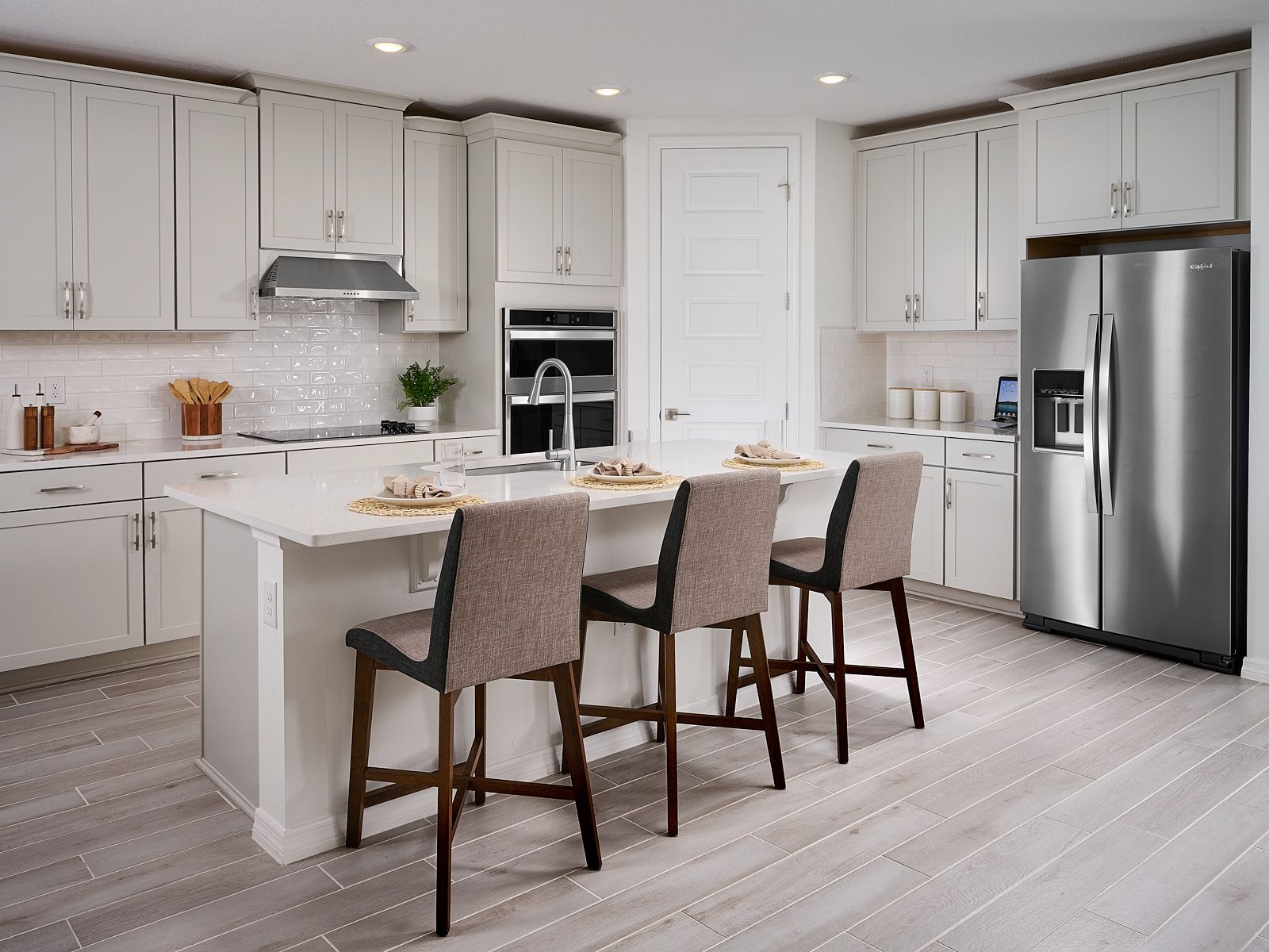 The Kitchen of the Jasmine Floorplan Modeled at Salt Meadows