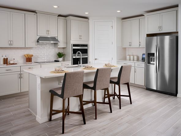 The Kitchen of the Jasmine Floorplan Modeled at Salt Meadows