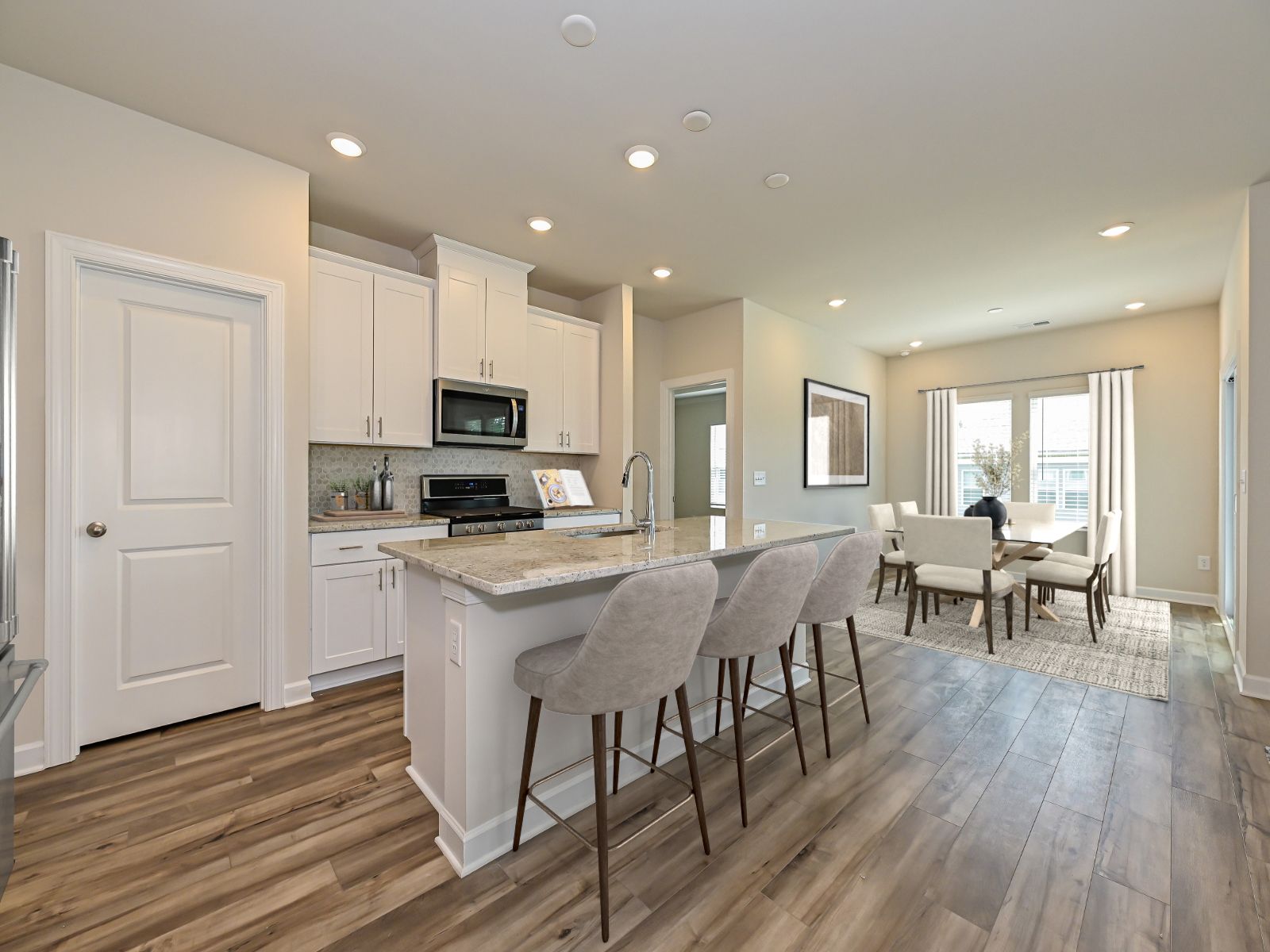 Your new kitchen with an oversized island and plenty of cabinet storage.