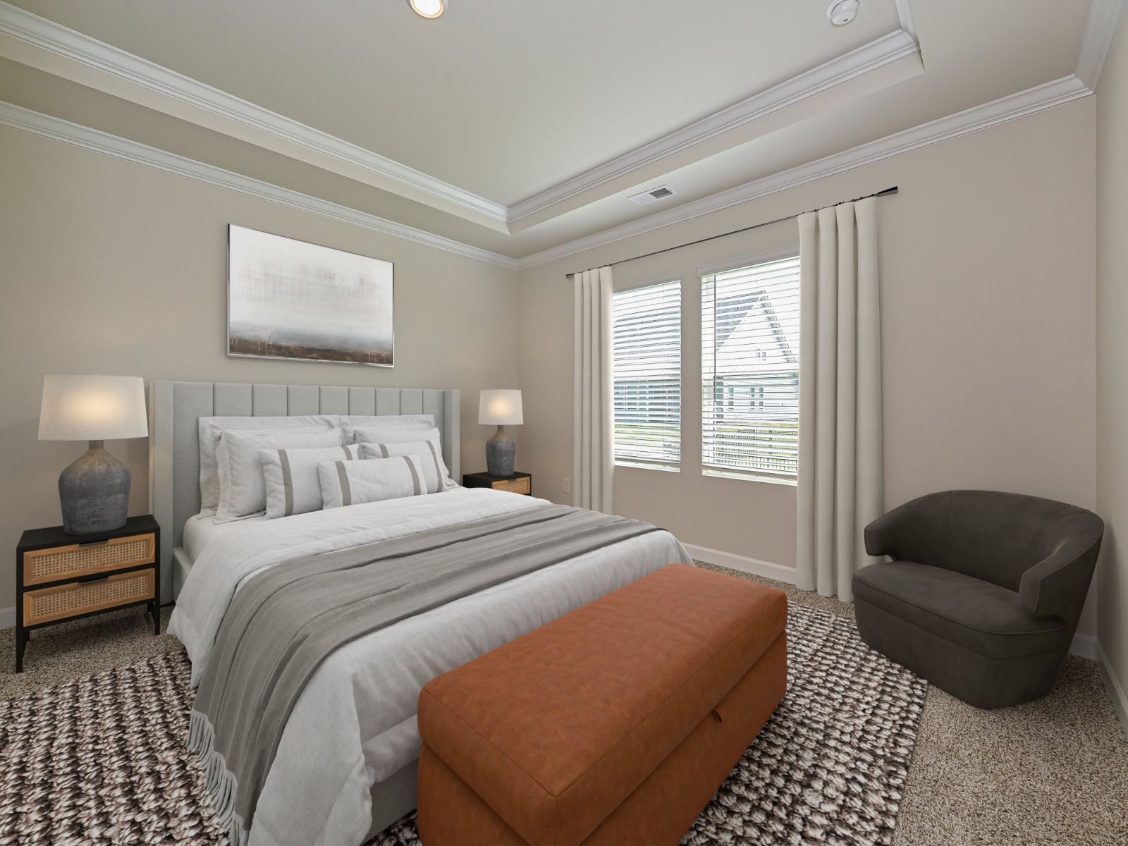 The primary bedroom is the perfect place to cozy up and read your favorite book.