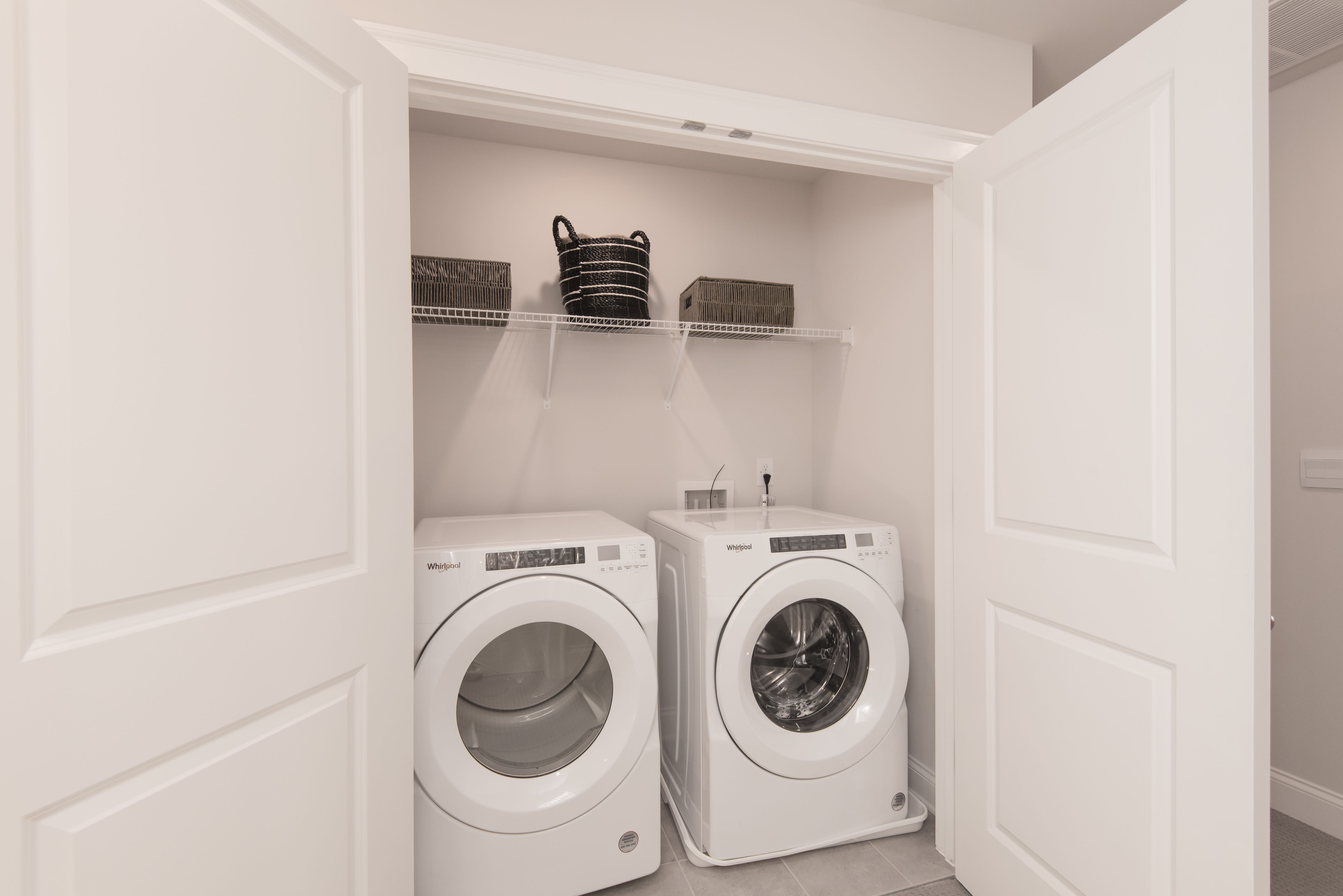 Easy access laundry room to complete chores.