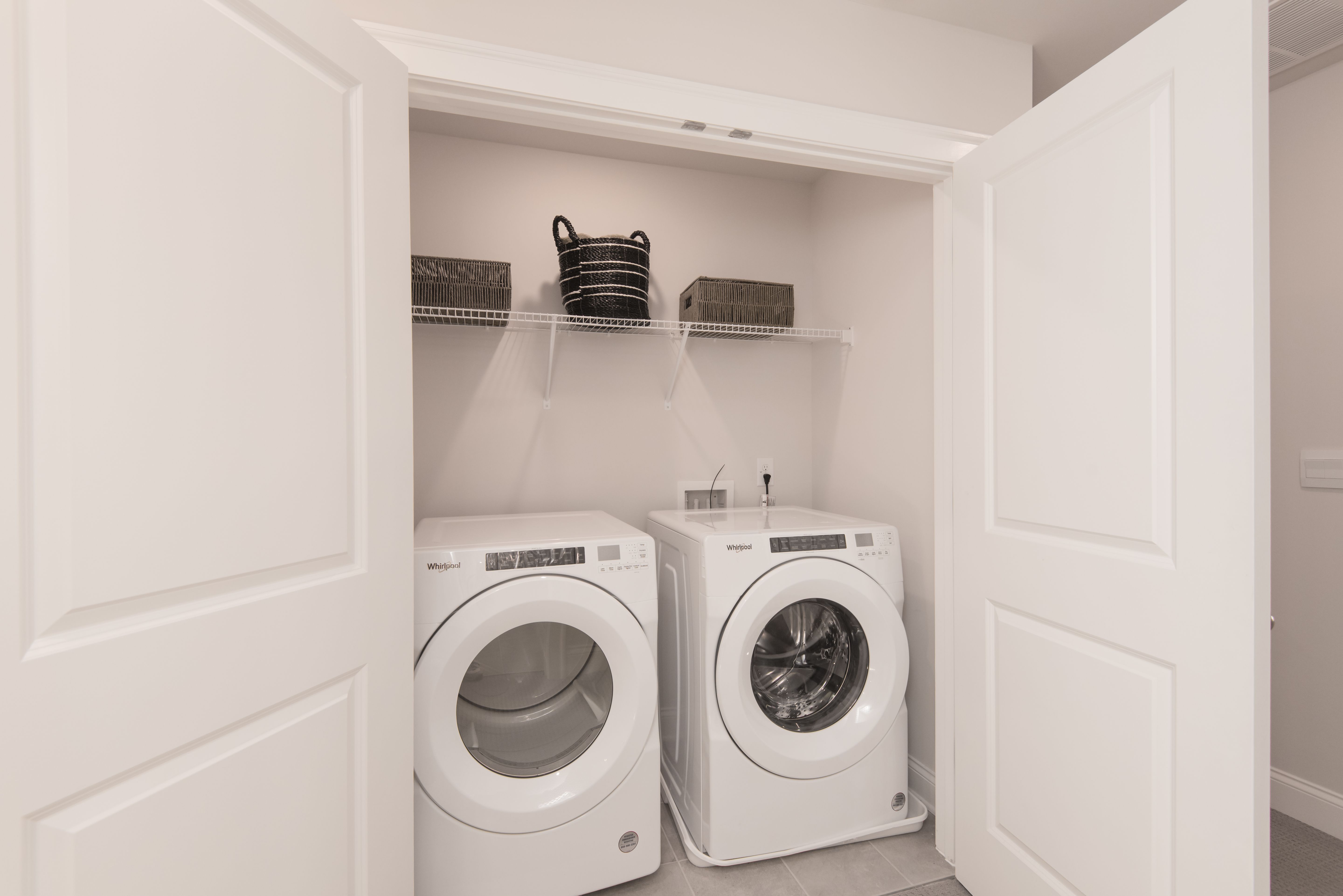 Easy access laundry room to complete chores.