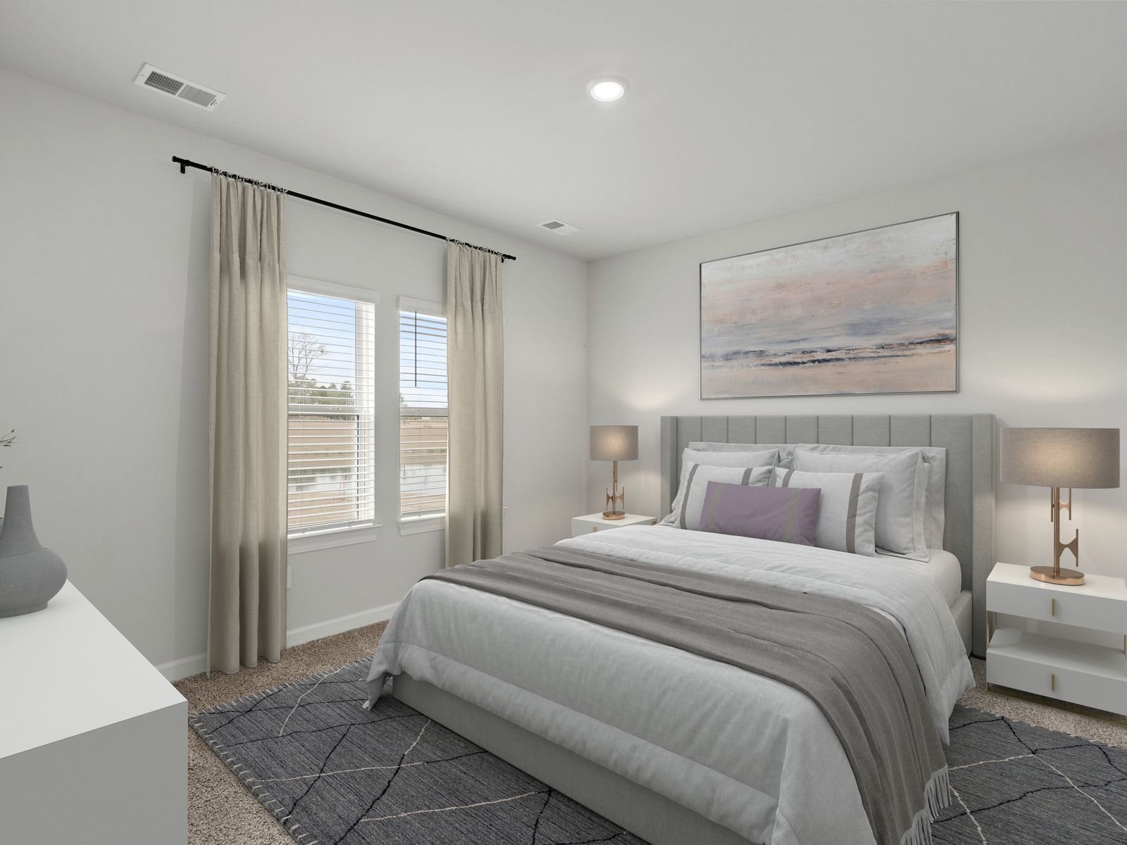 Relax and unwind in the stunning primary suite.