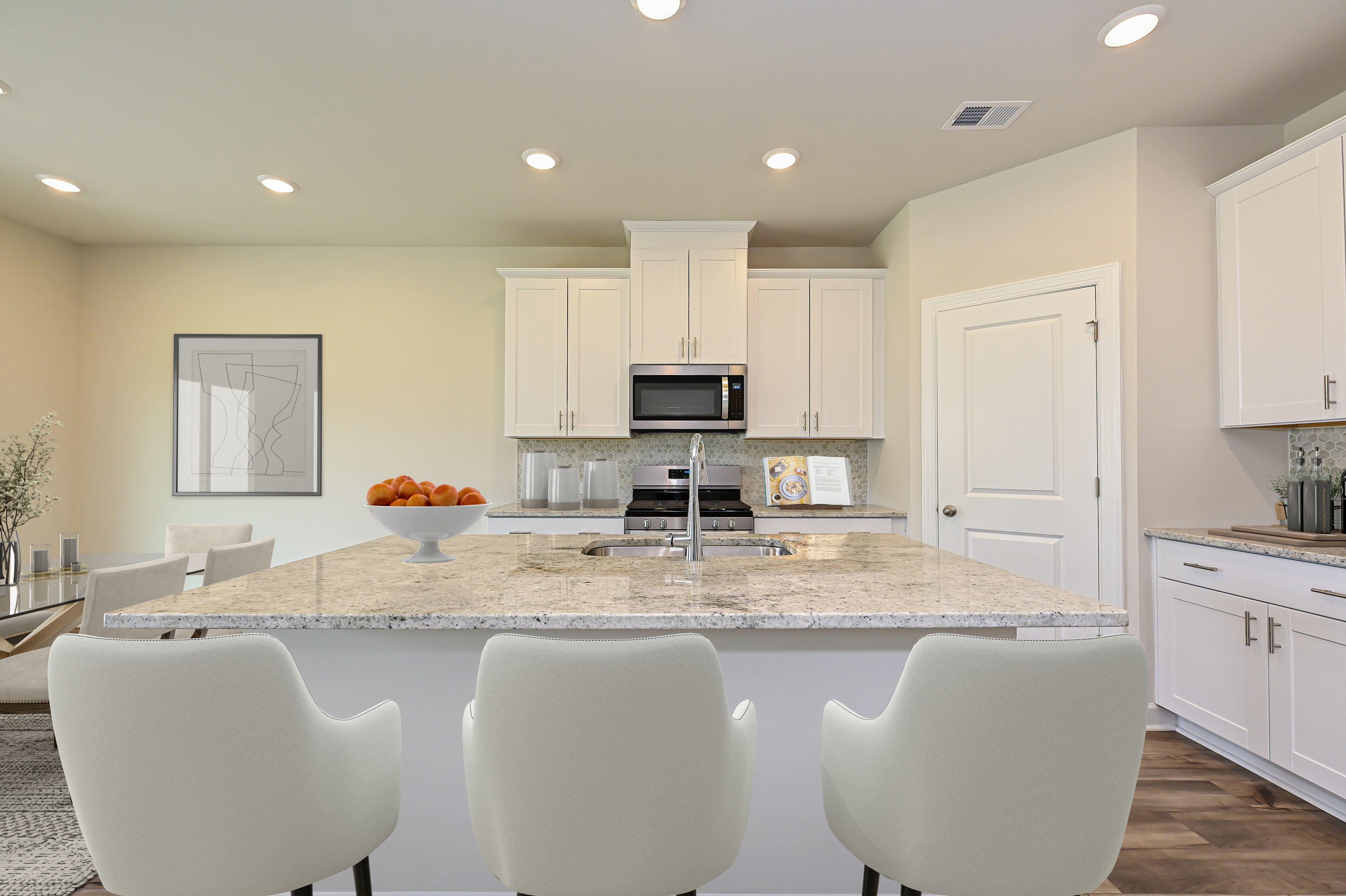 The oversized island makes this kitchen both functional and spacious.