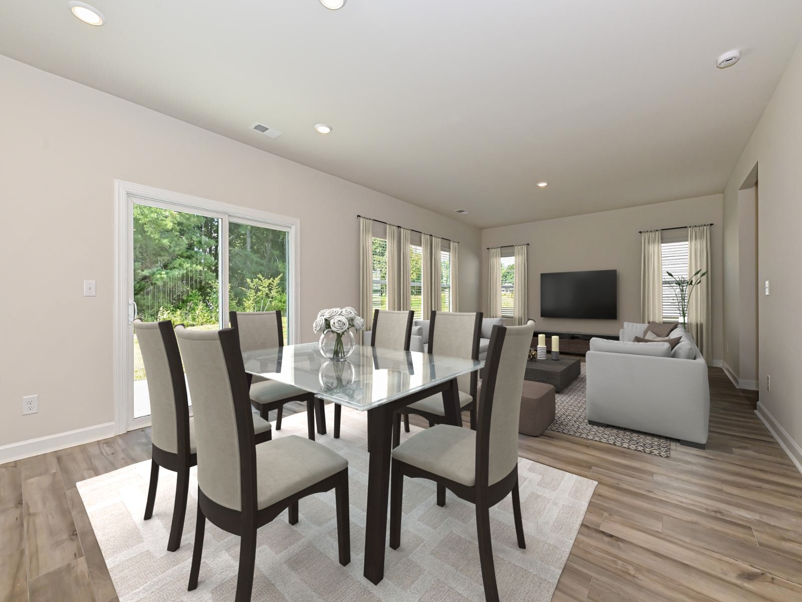 An inviting dining room that seamlessly flows into the heart of the home.