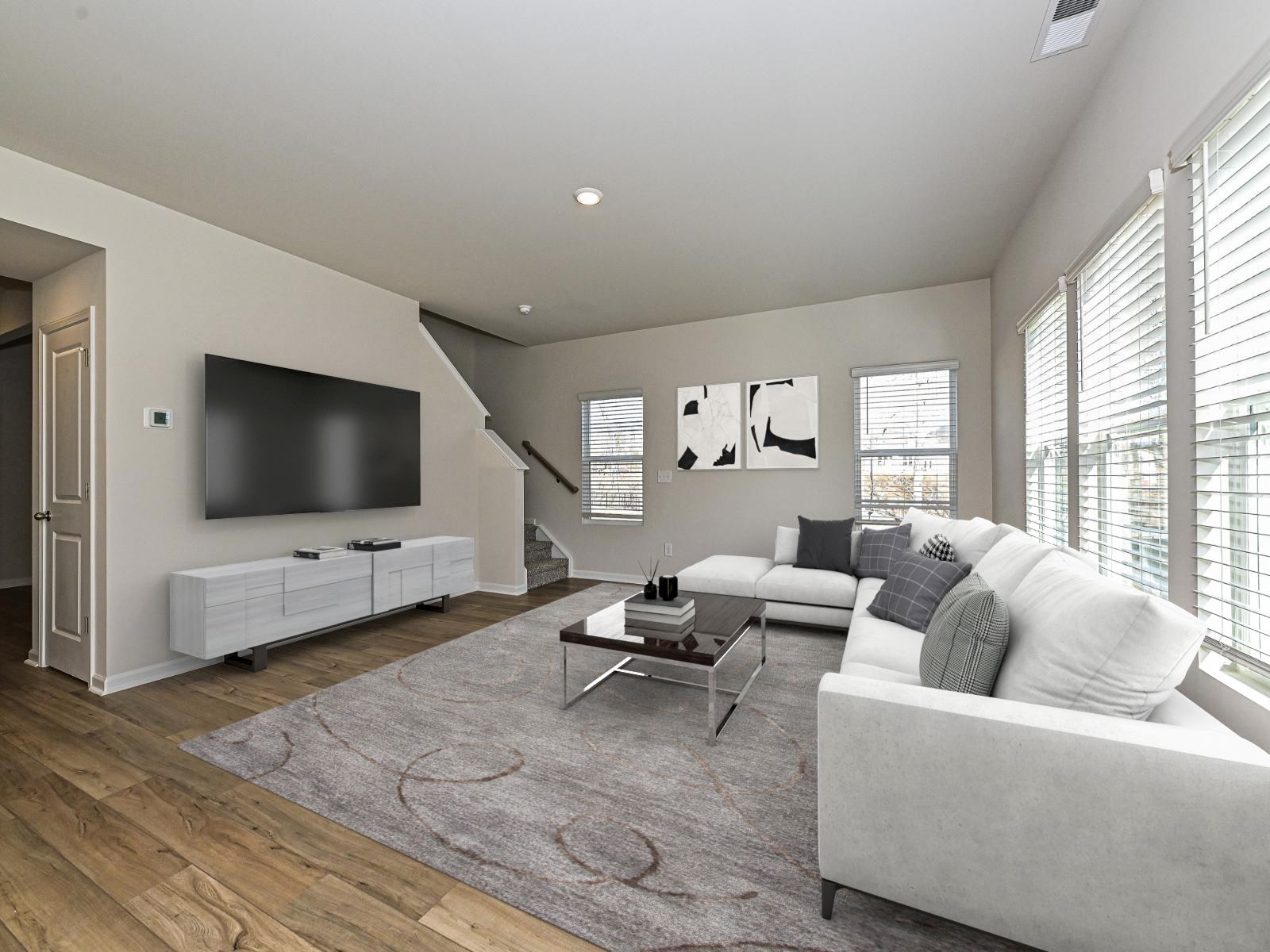 Watch your favorite movie or curl up with a good book in the great room.