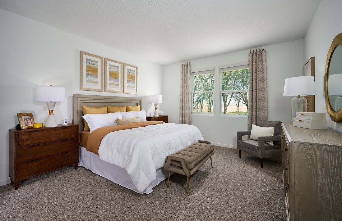 Primary bedroom of the Orchid Plan.