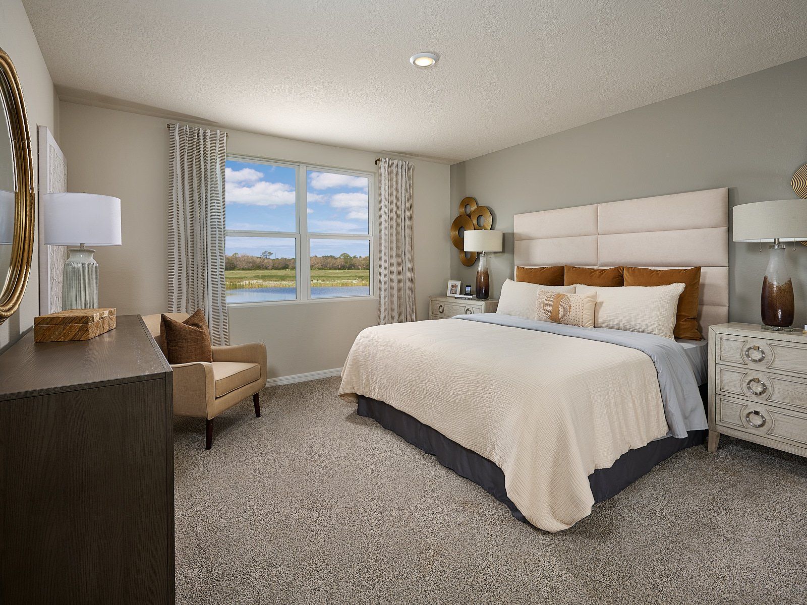 The primary bedroom of the Foxglove modeled at Magnolia Bay.