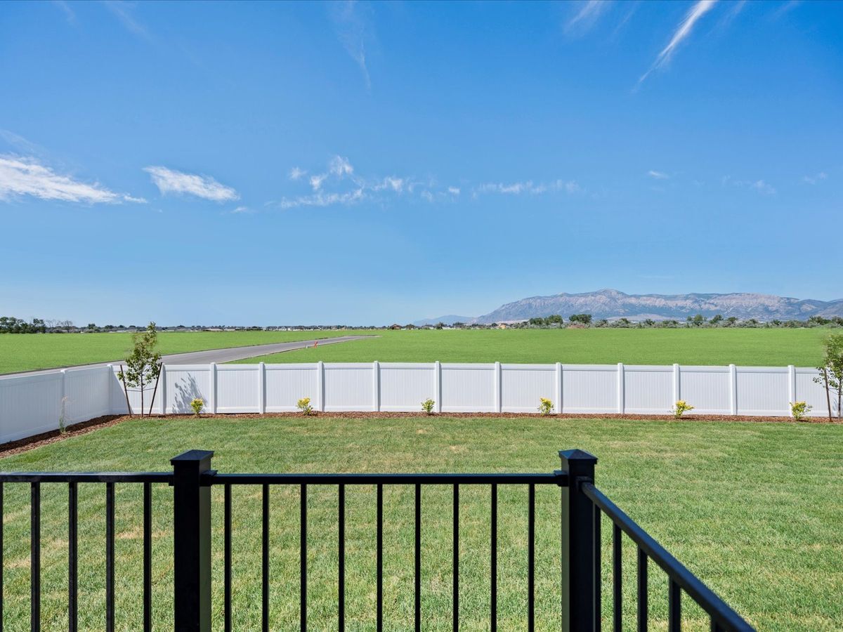 The Residence 6 floorplan exterior image taken at a Meritage Homes Community in West Haven, UT.