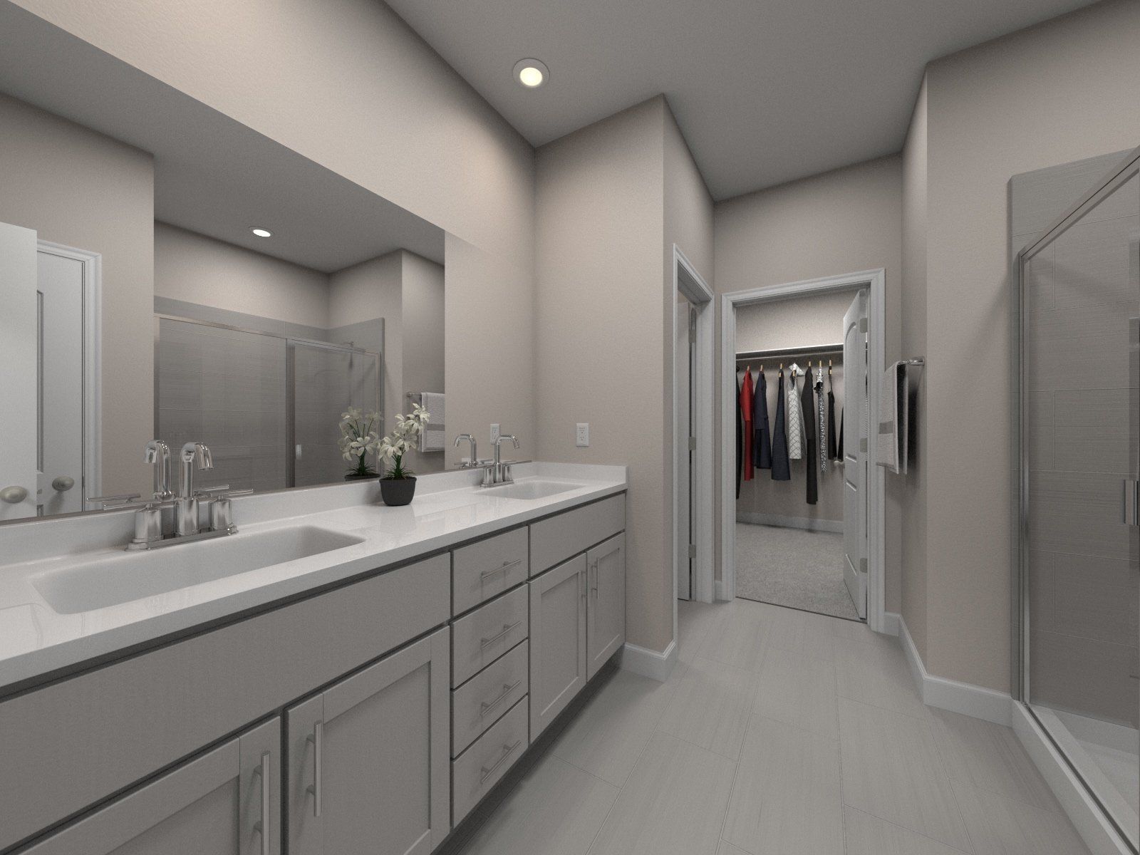 The primary bathroom offers dual vanity sinks and a walk-in shower.