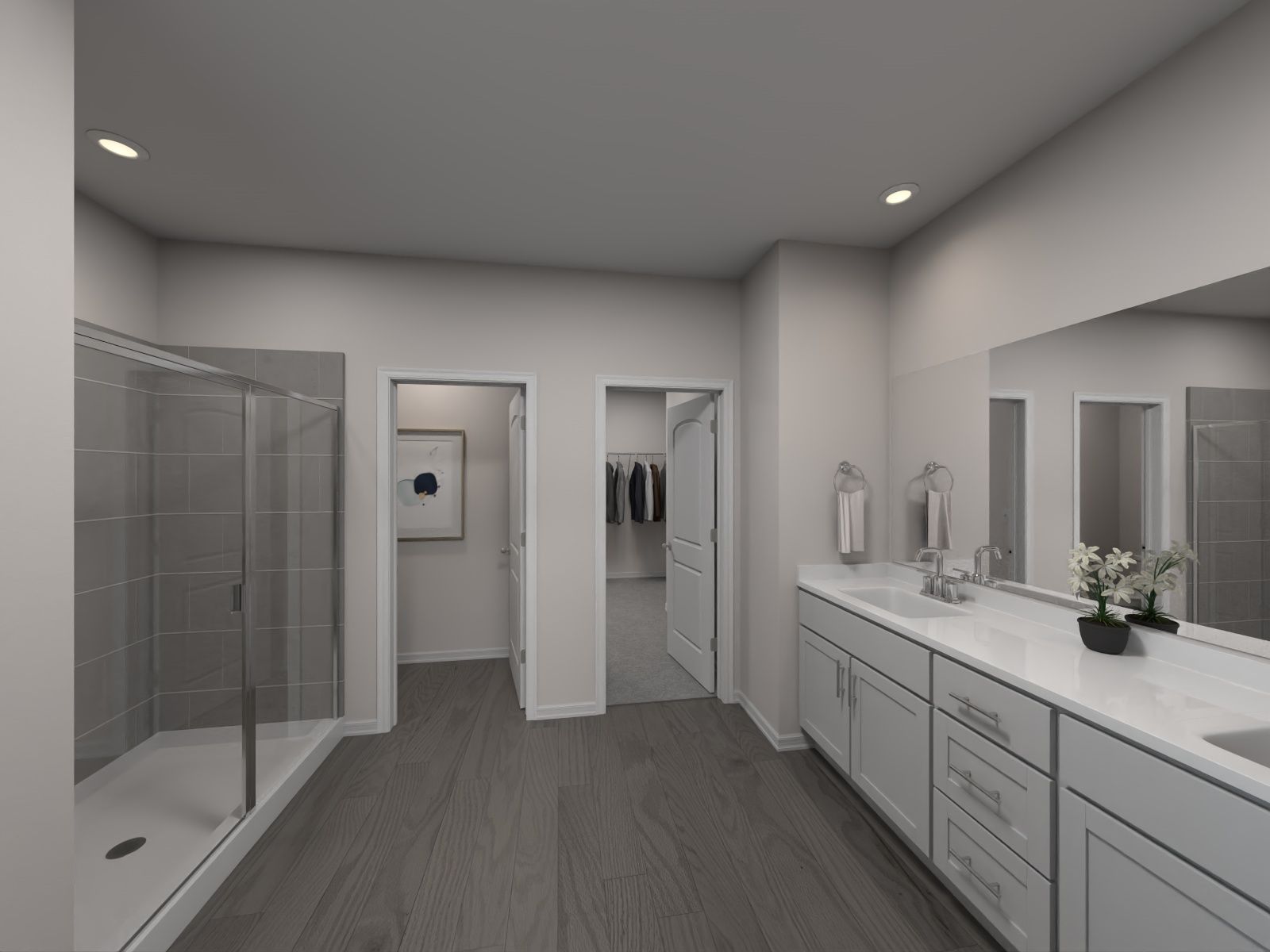 The primary bath offers dual sinks and a walk-in shower.