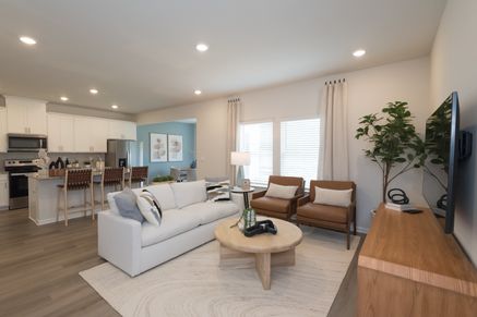 Enjoy an open-concept floorplan, where the kitchen overlooks the living and dining room.