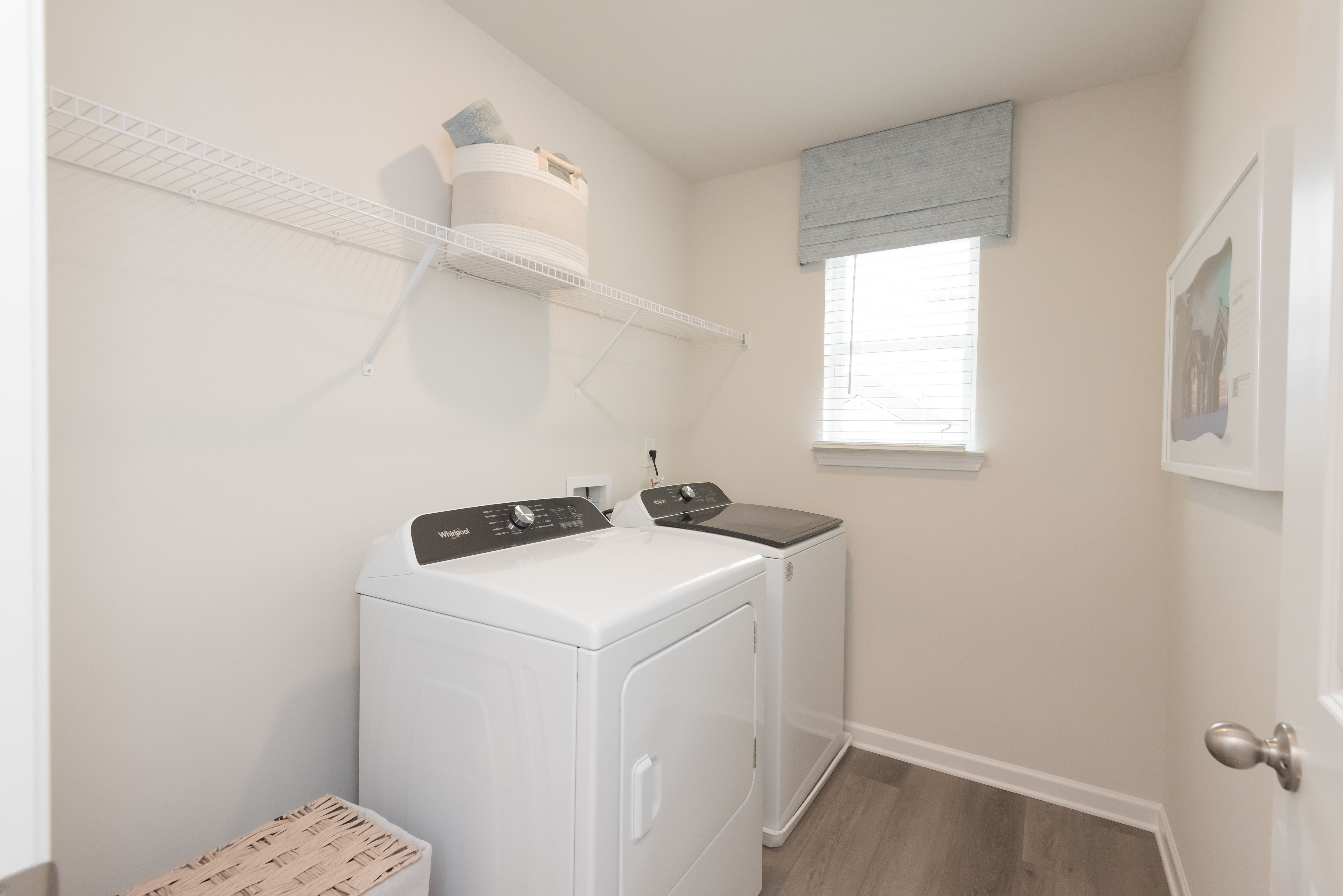 Laundry days have never been easier with this large, spacious laundry room.