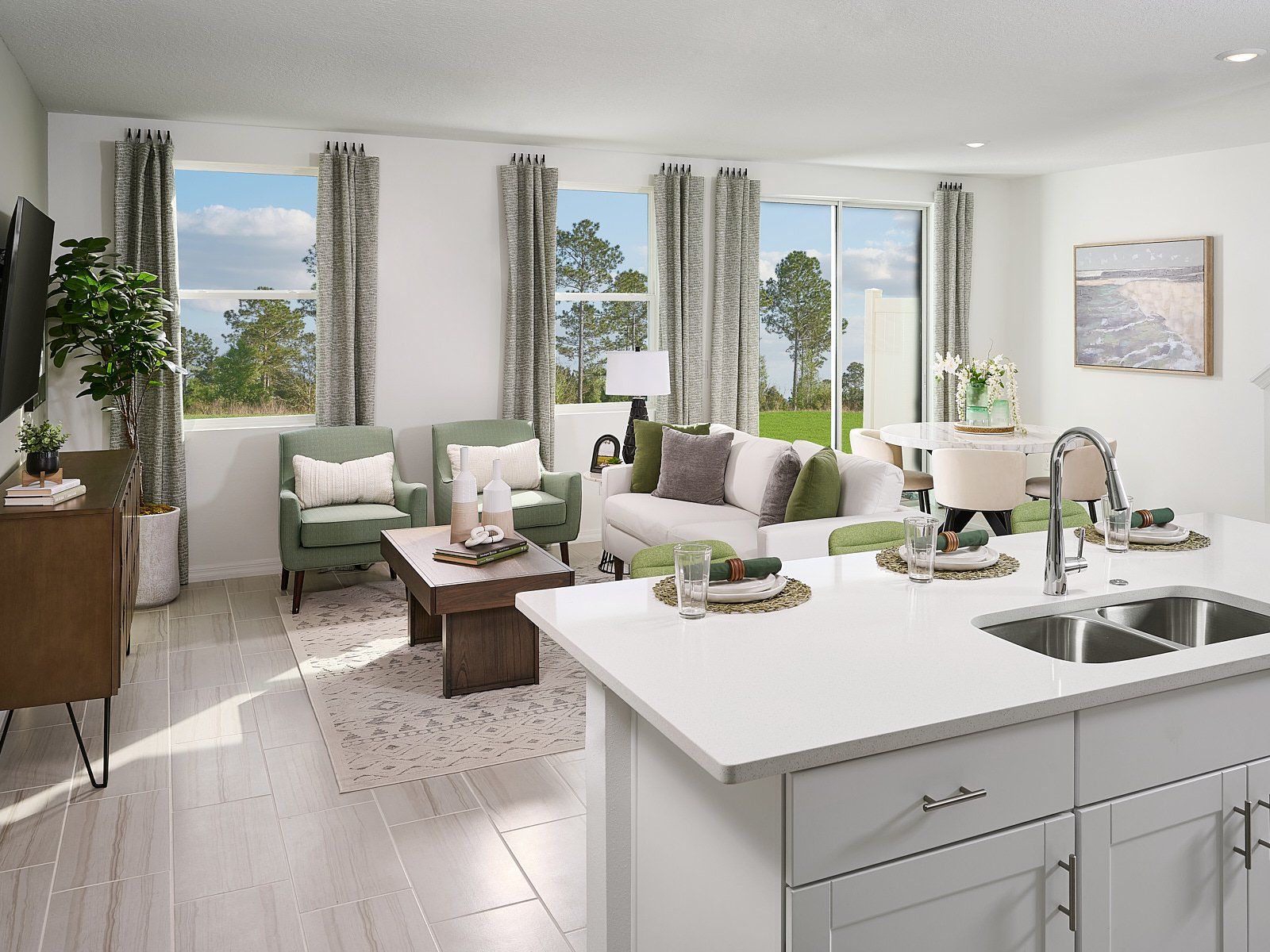 Great room in the Summit floorplan at The Meadow at Crossprairie