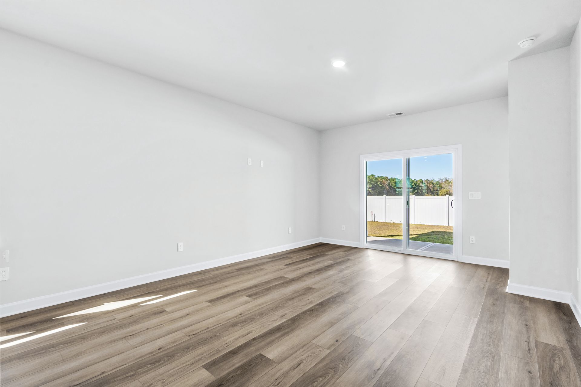 The great room comes with plenty of space that is great for hosting or relaxing with family.