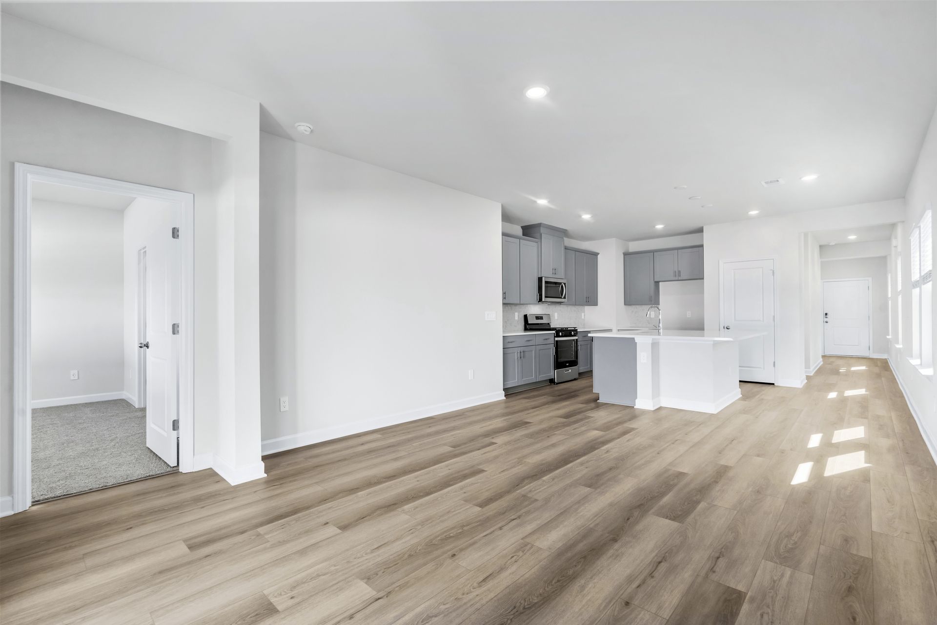 The stunning open-concept floorplan allows for easy flow between the kitchen and dining areas.