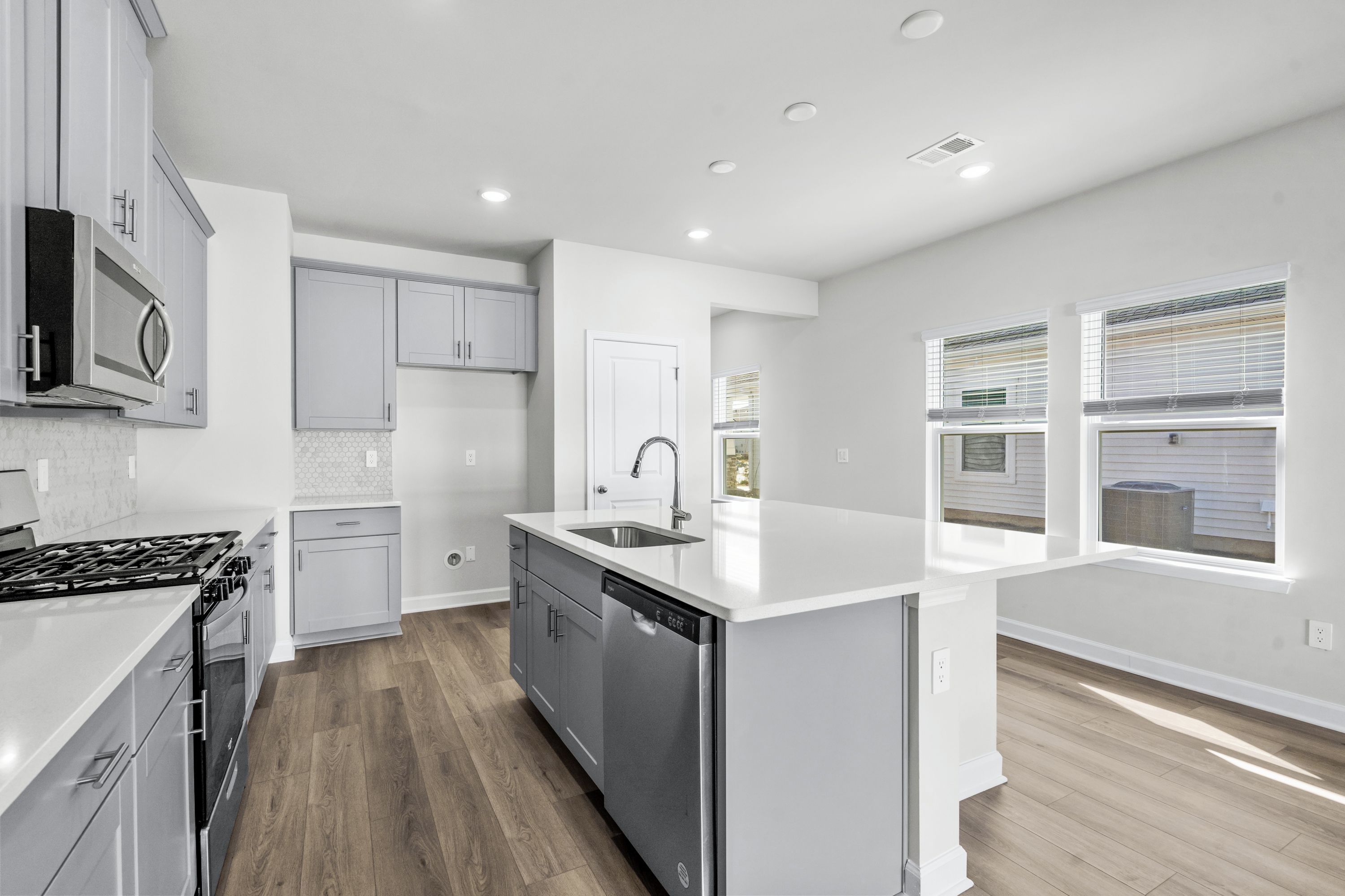 The well-appointed kitchen features plenty of counter space to make meal prep a breeze.
