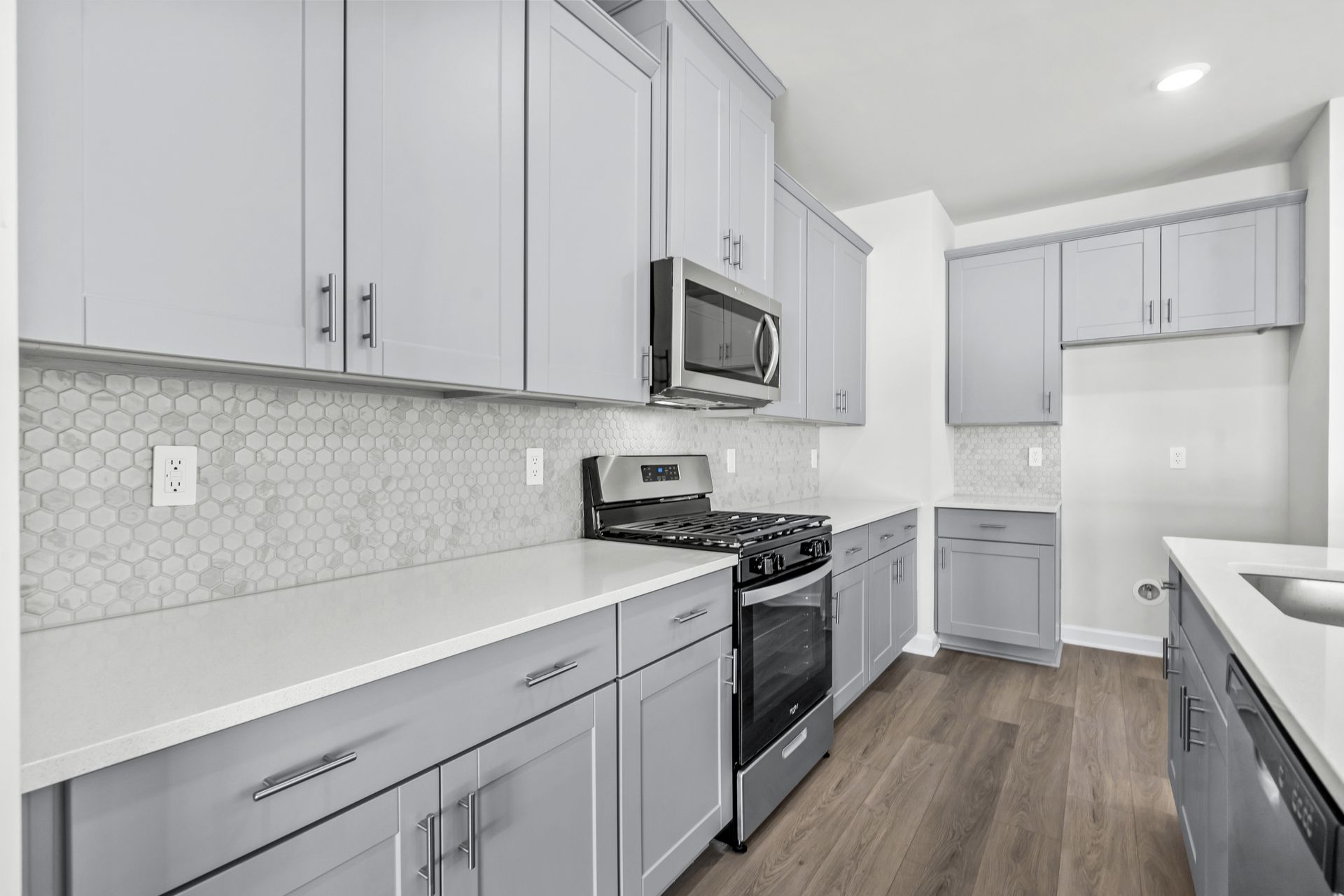 The well-appointed kitchen features plenty of counter space to make meal prep a breeze.
