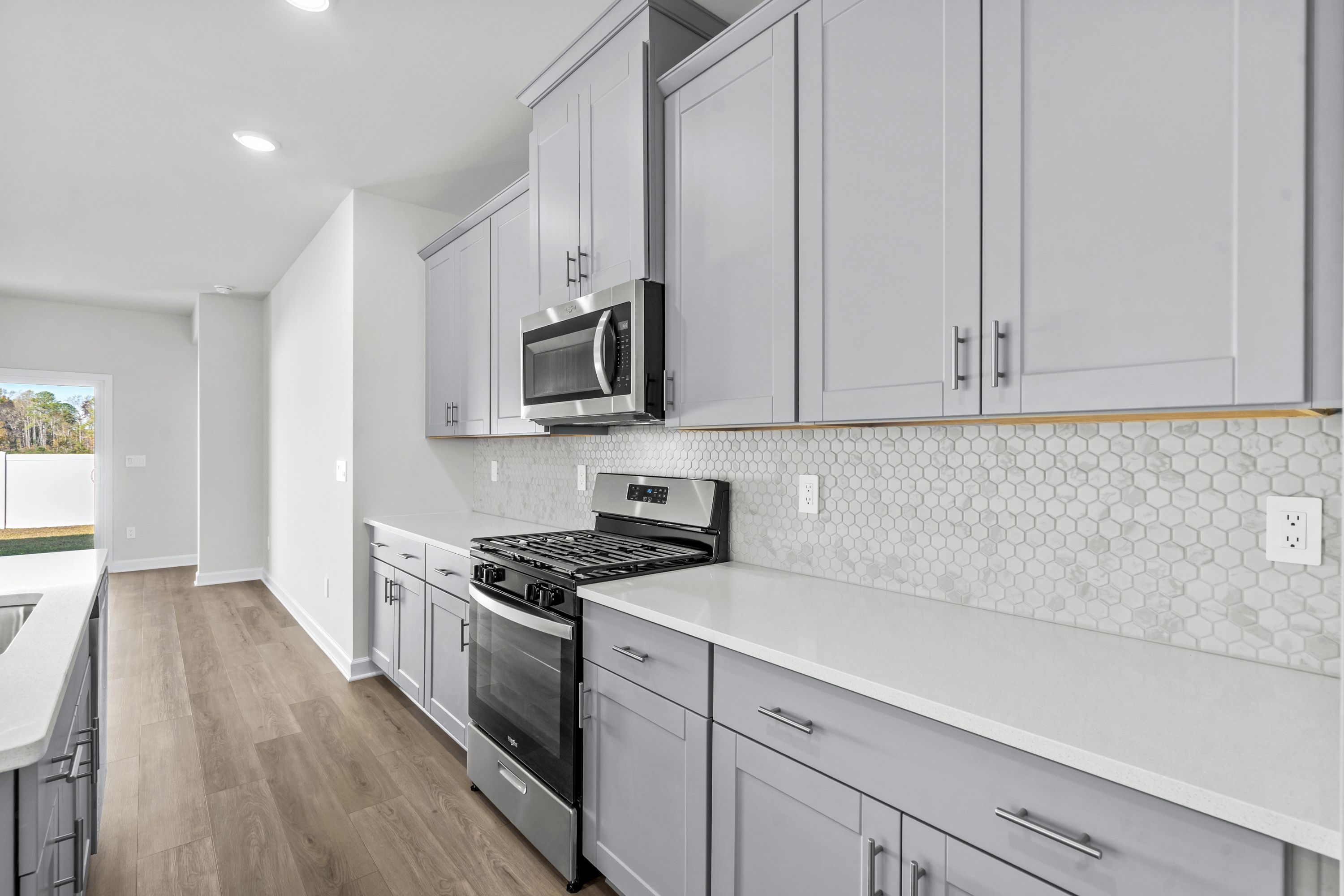 The well-appointed kitchen features plenty of counter space to make meal prep a breeze.