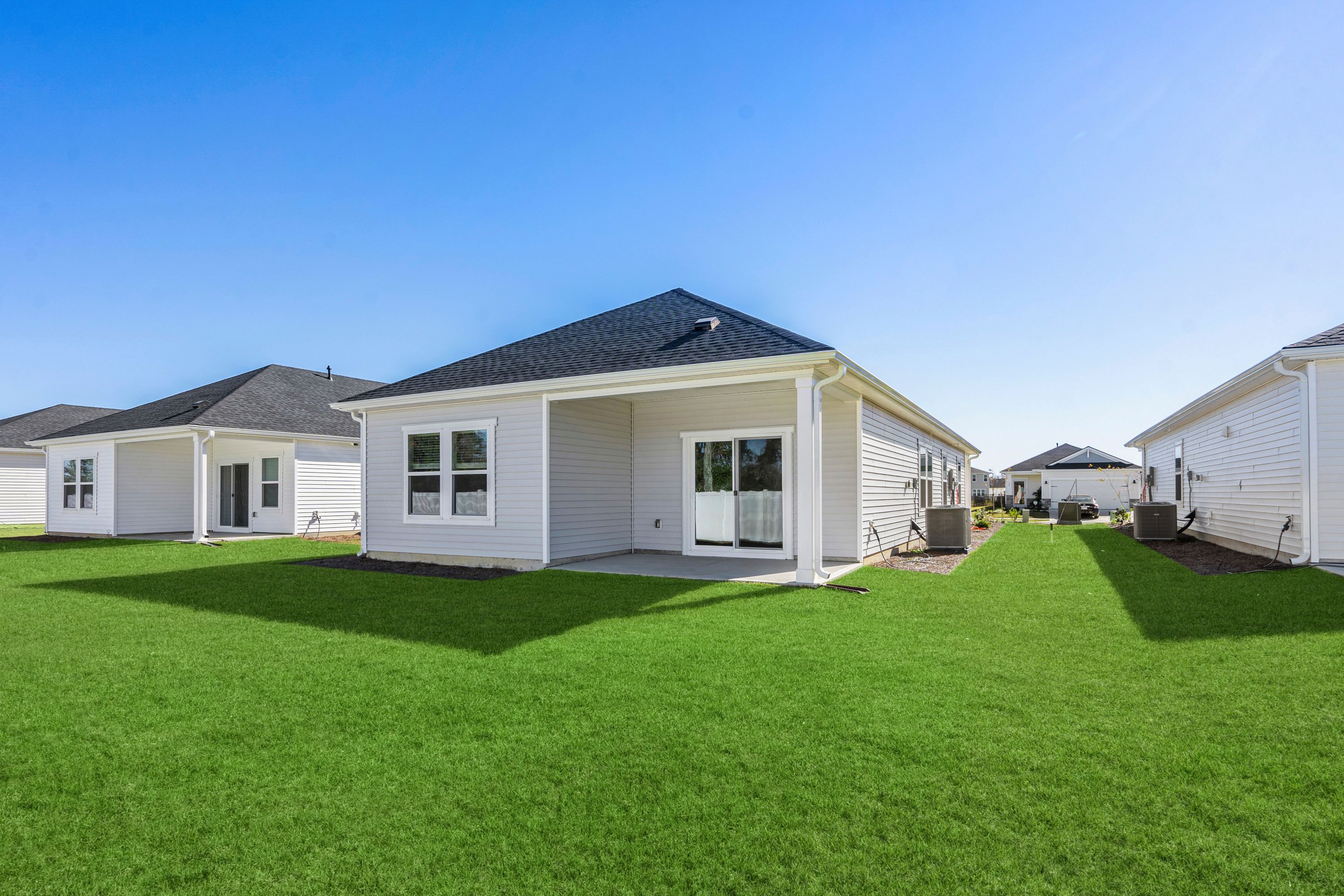 A rear covered patio is great for outdoor relaxation.