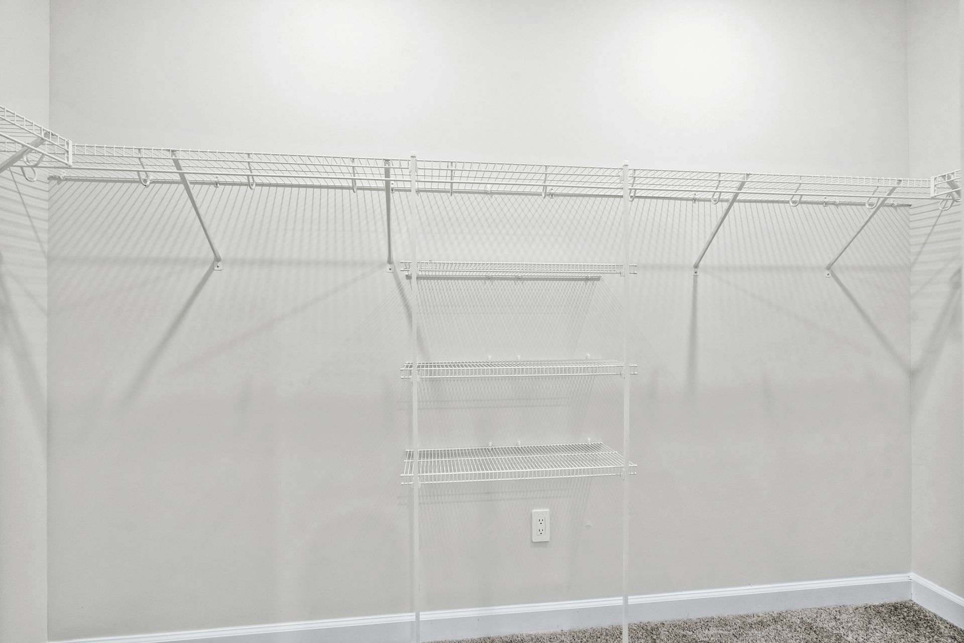 The walk-in closet off of the primary bathroom offers an abundance of space.