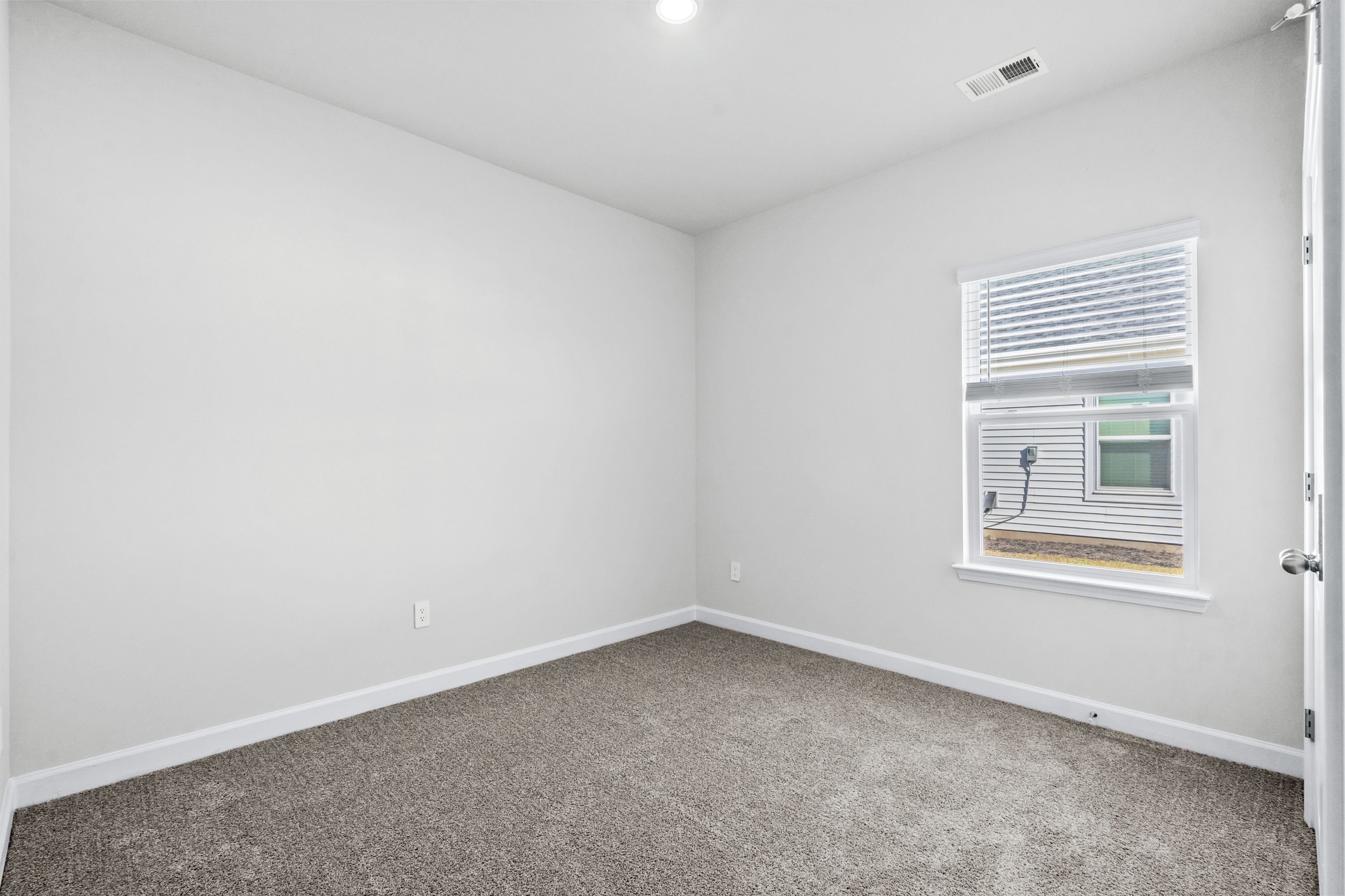 Spacious secondary bedrooms offer plenty of room for the whole family and overnight guests.