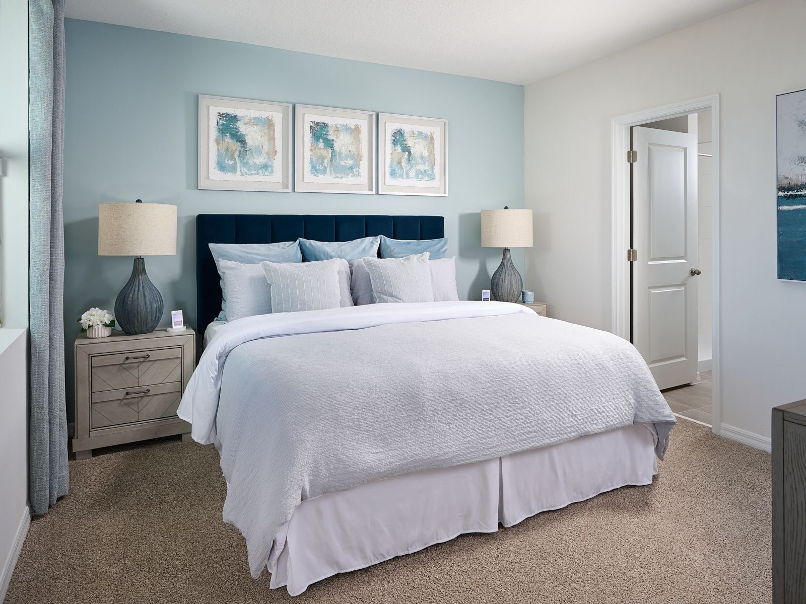 The primary bedroom of the Denali modeled at Benton Hills.