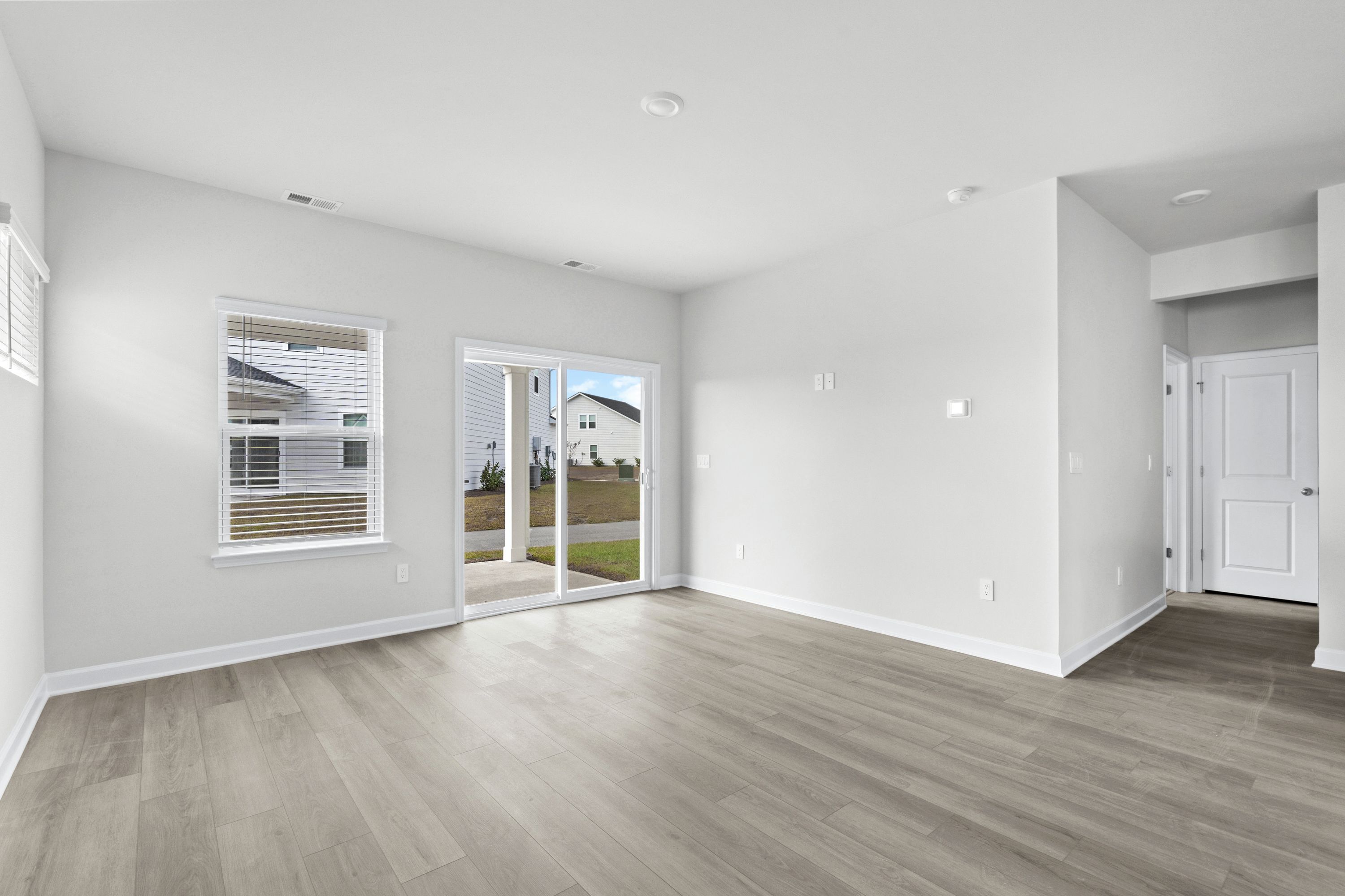 The great room comes with plenty of space that is great for hosting or relaxing with family.