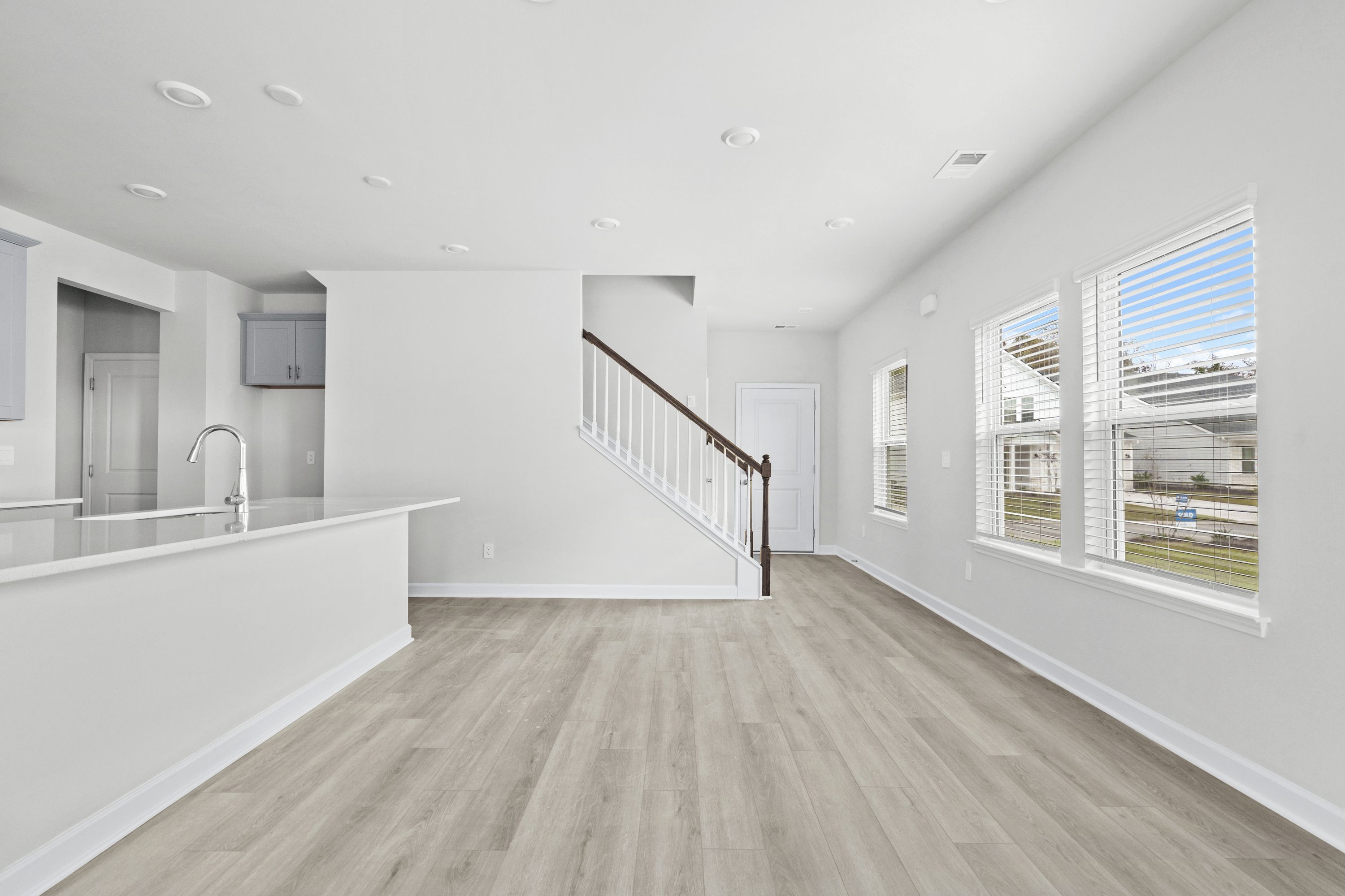 The stunning open-concept floorplan allows for easy flow between the kitchen and dining areas.