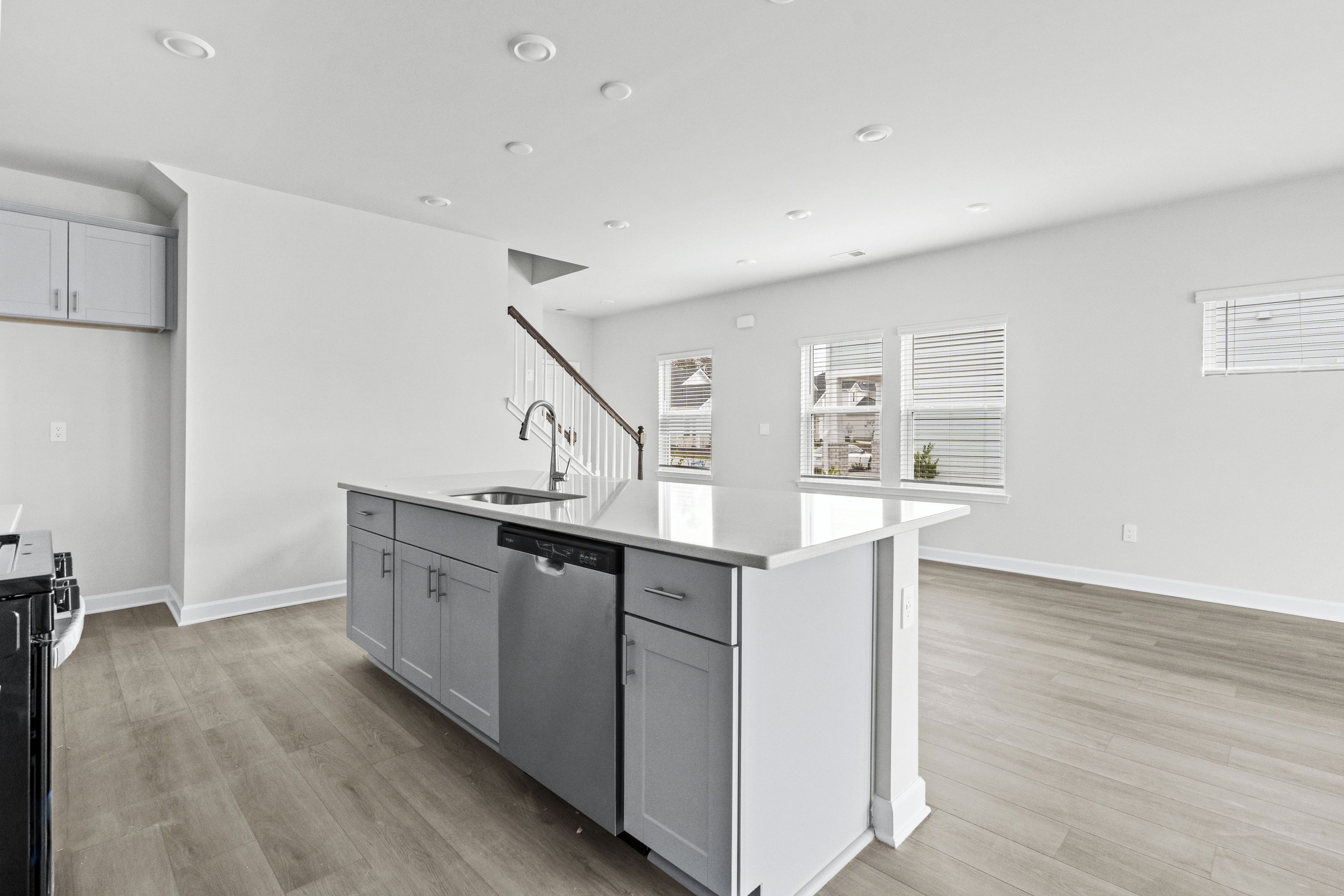 The well-appointed kitchen features a large island to make meal prep a breeze.