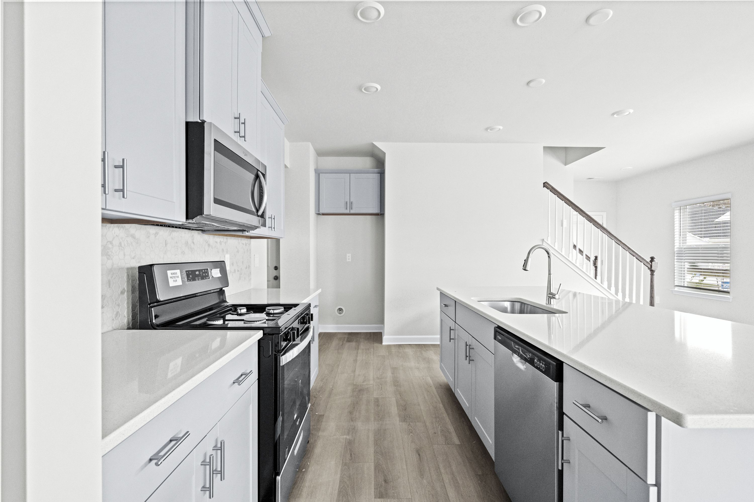 The well-appointed kitchen features plenty of counter space to make meal prep a breeze.