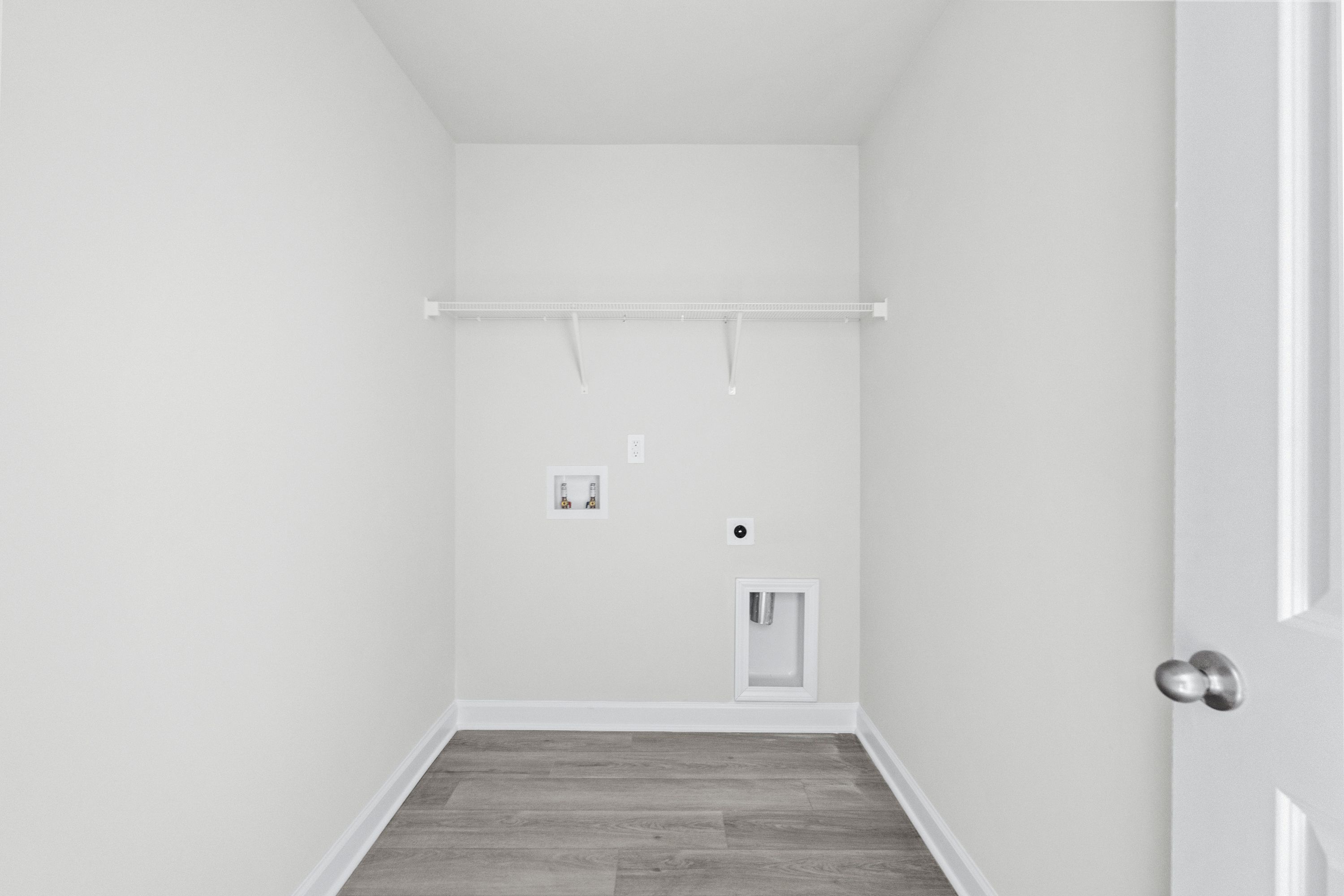 A separate laundry room makes doing chores a breeze.