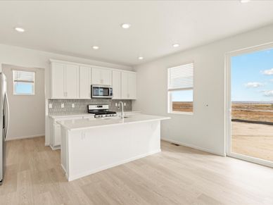 The Chatfield floorplan interior image taken at a Meritage Homes community in Colorado Springs.