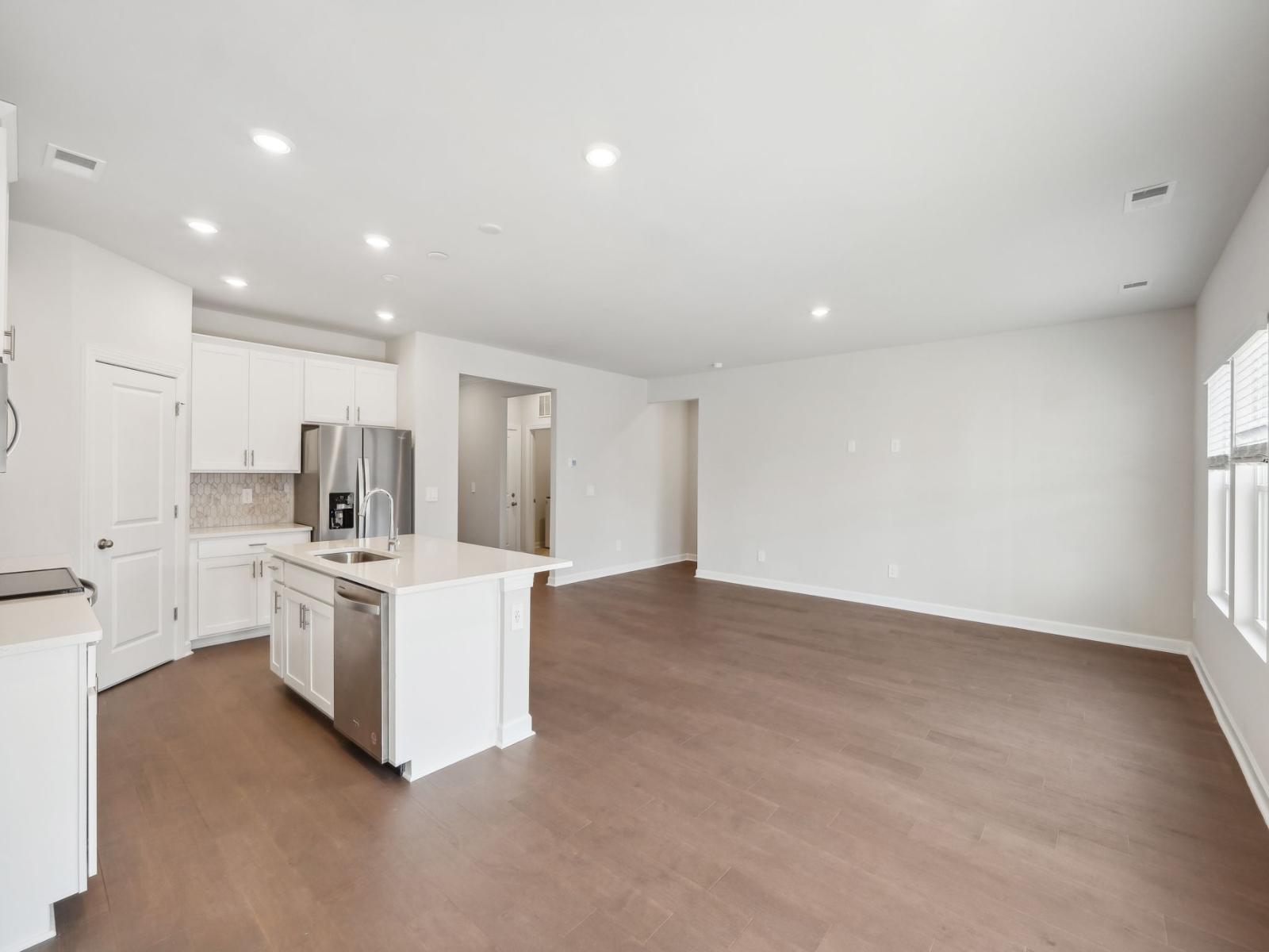 The great room connecting to the kitchen for an open-concept feel.