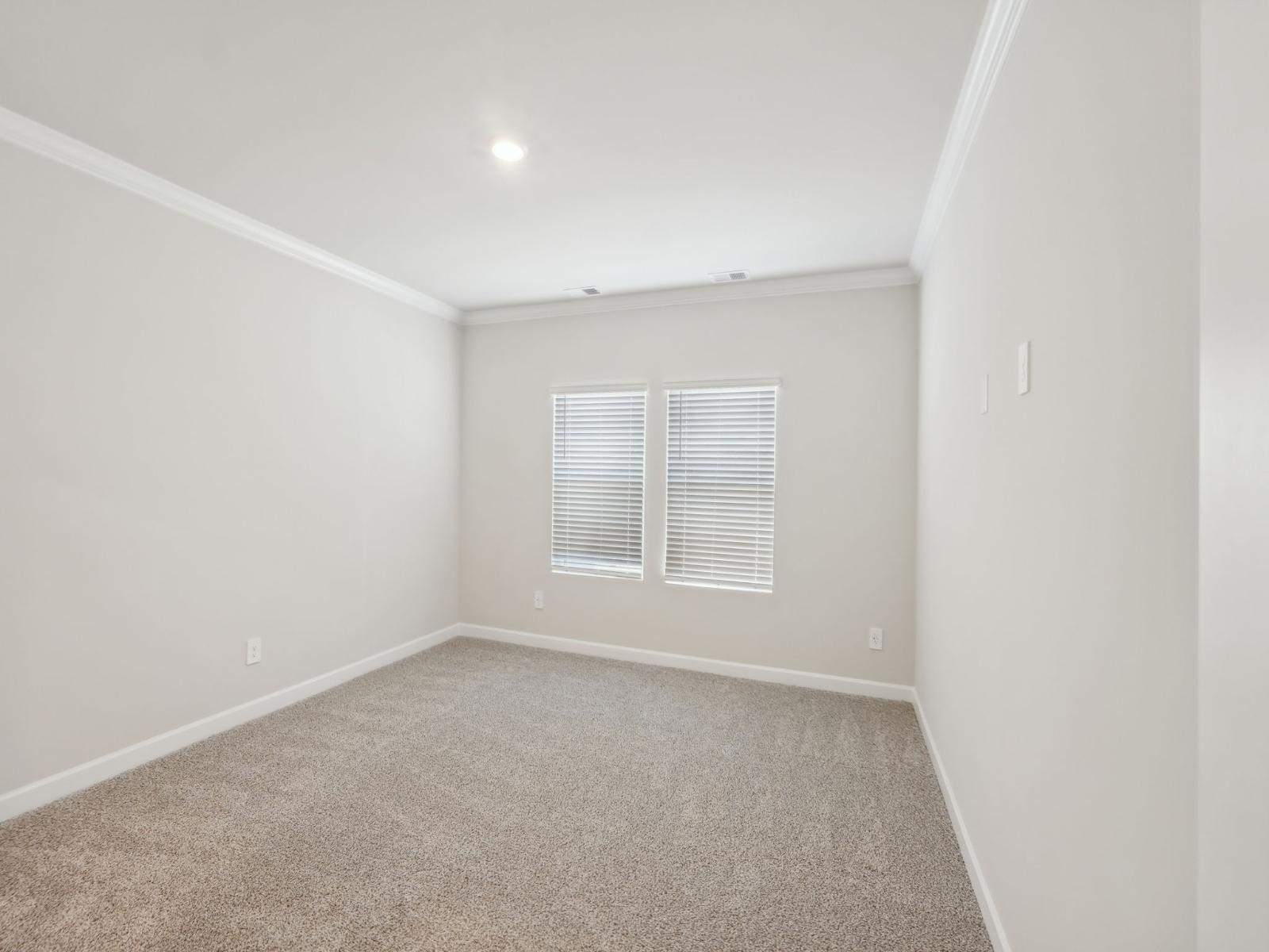 The primary suite with a perfect amount of natural light.