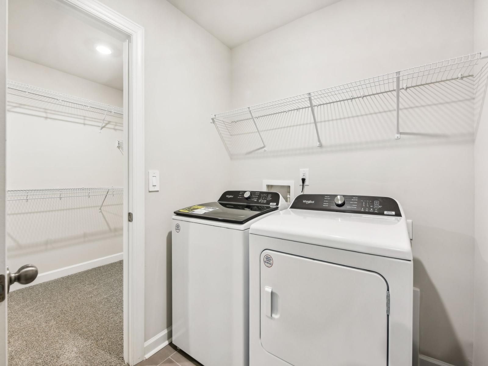 Our laundry room features multiple shelves for organizing, sorting, and folding clothes.