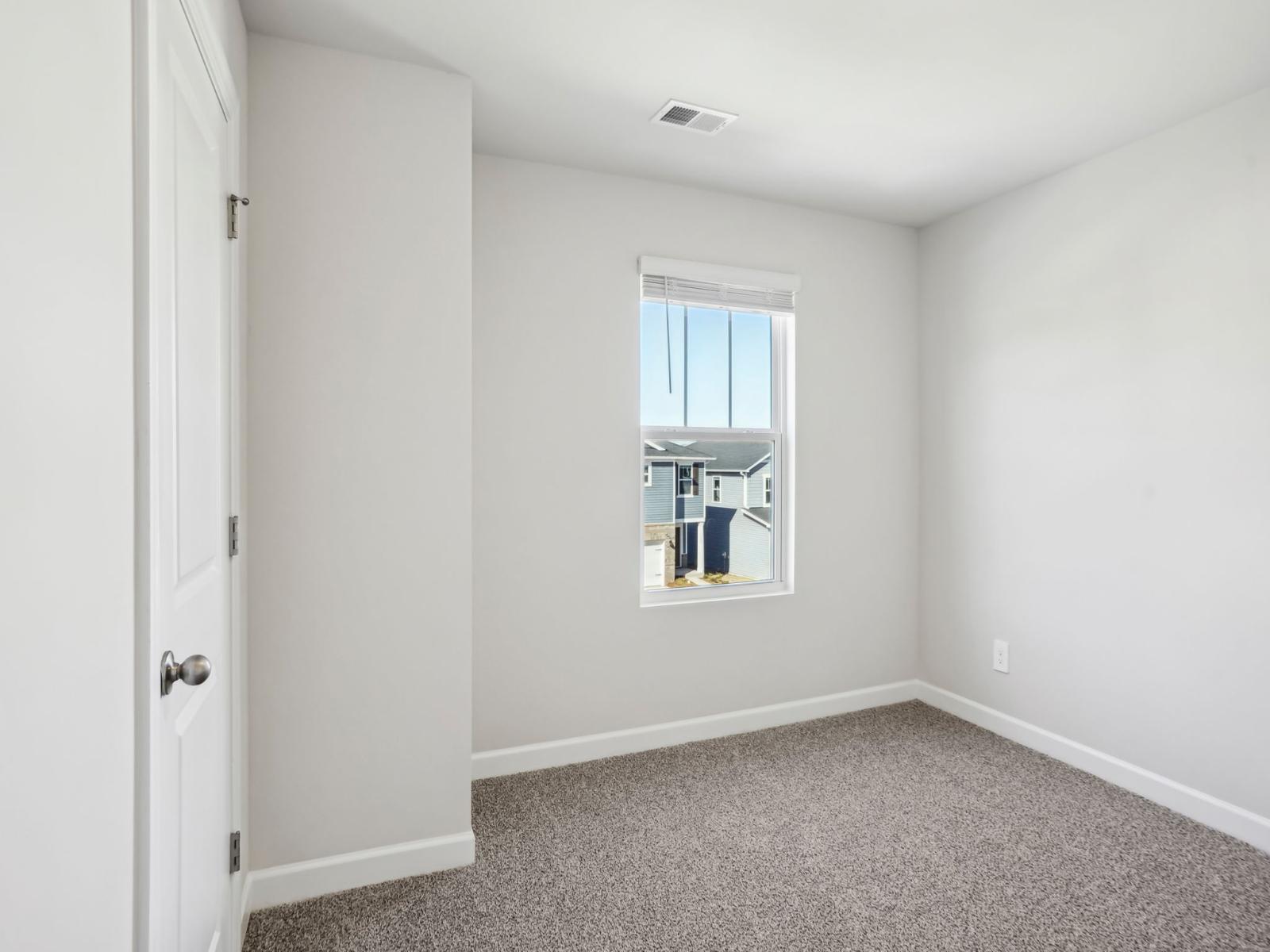 This secondary bedroom is the perfect space for guests.