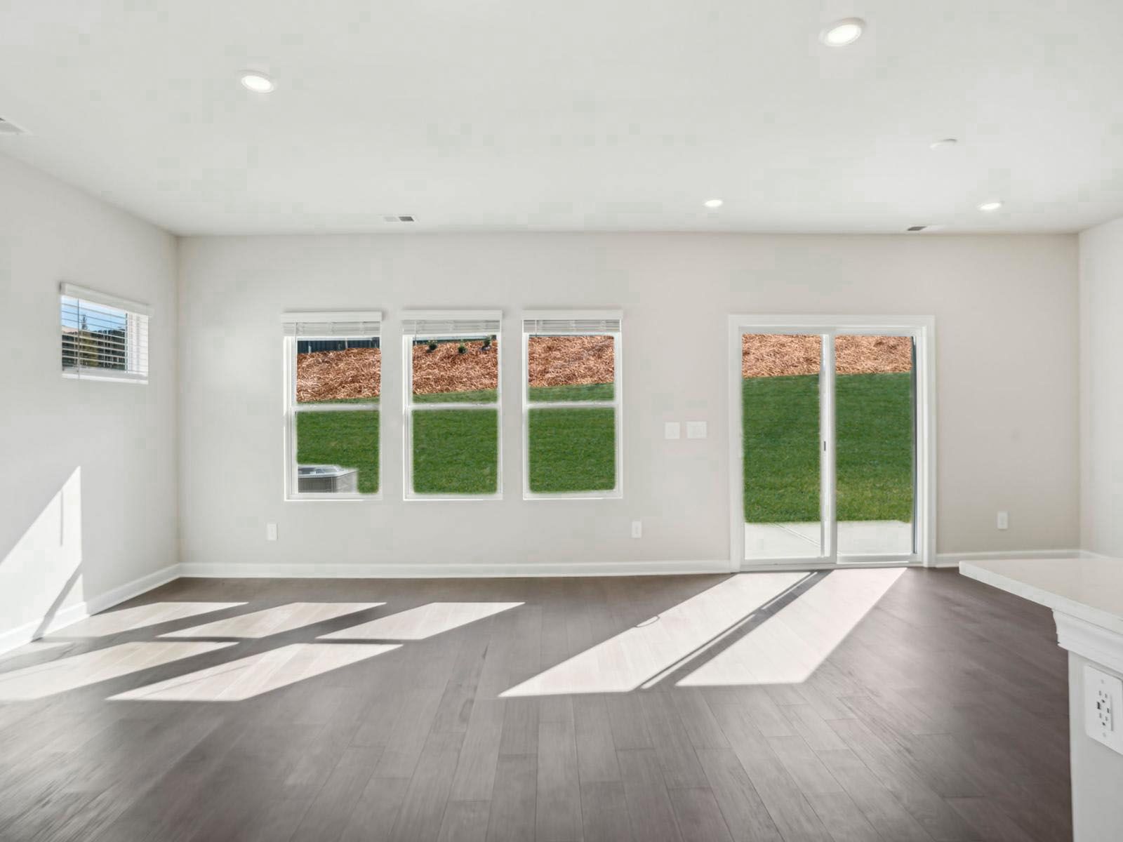 The great room is filled with an abundance of natural light.