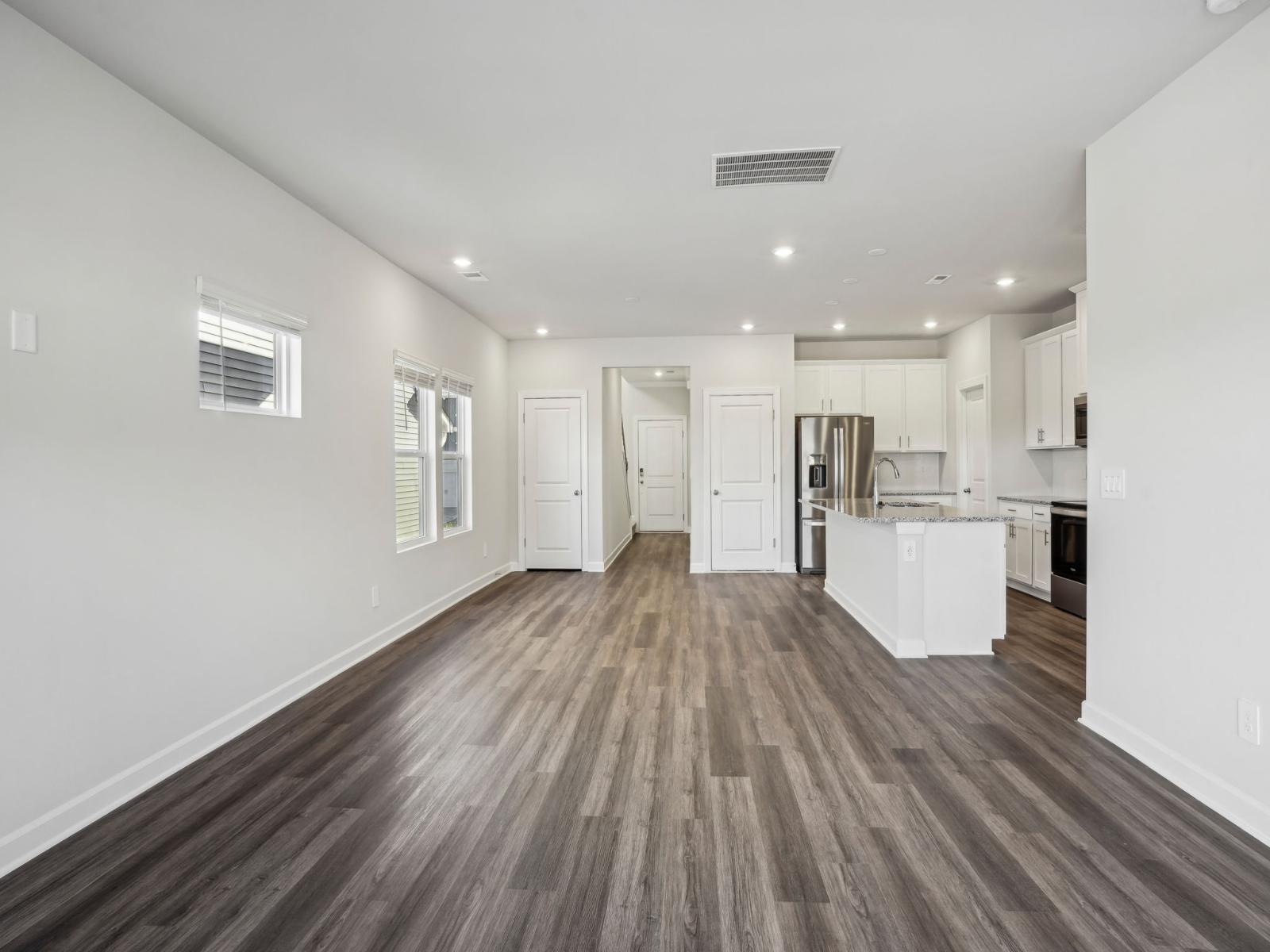 The great room flows seamlessly into the kitchen.