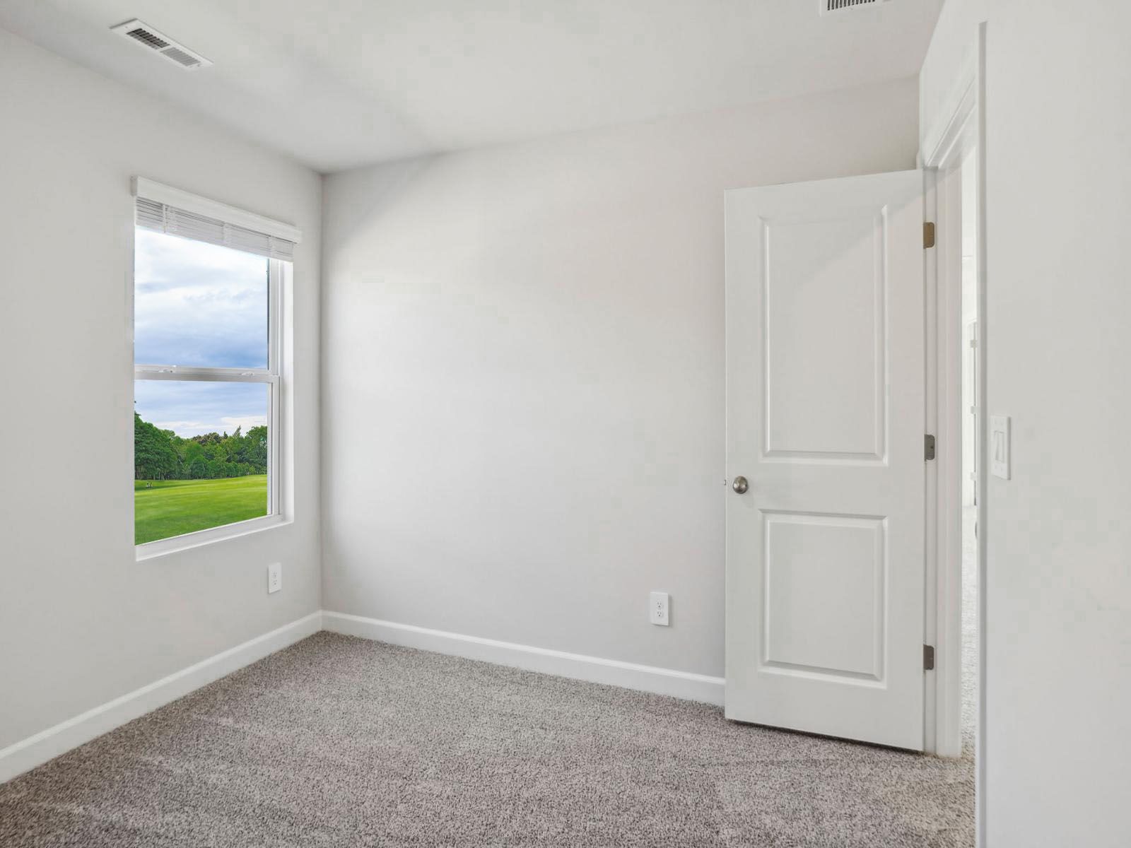 This secondary bedroom is a perfect space for your home gym.