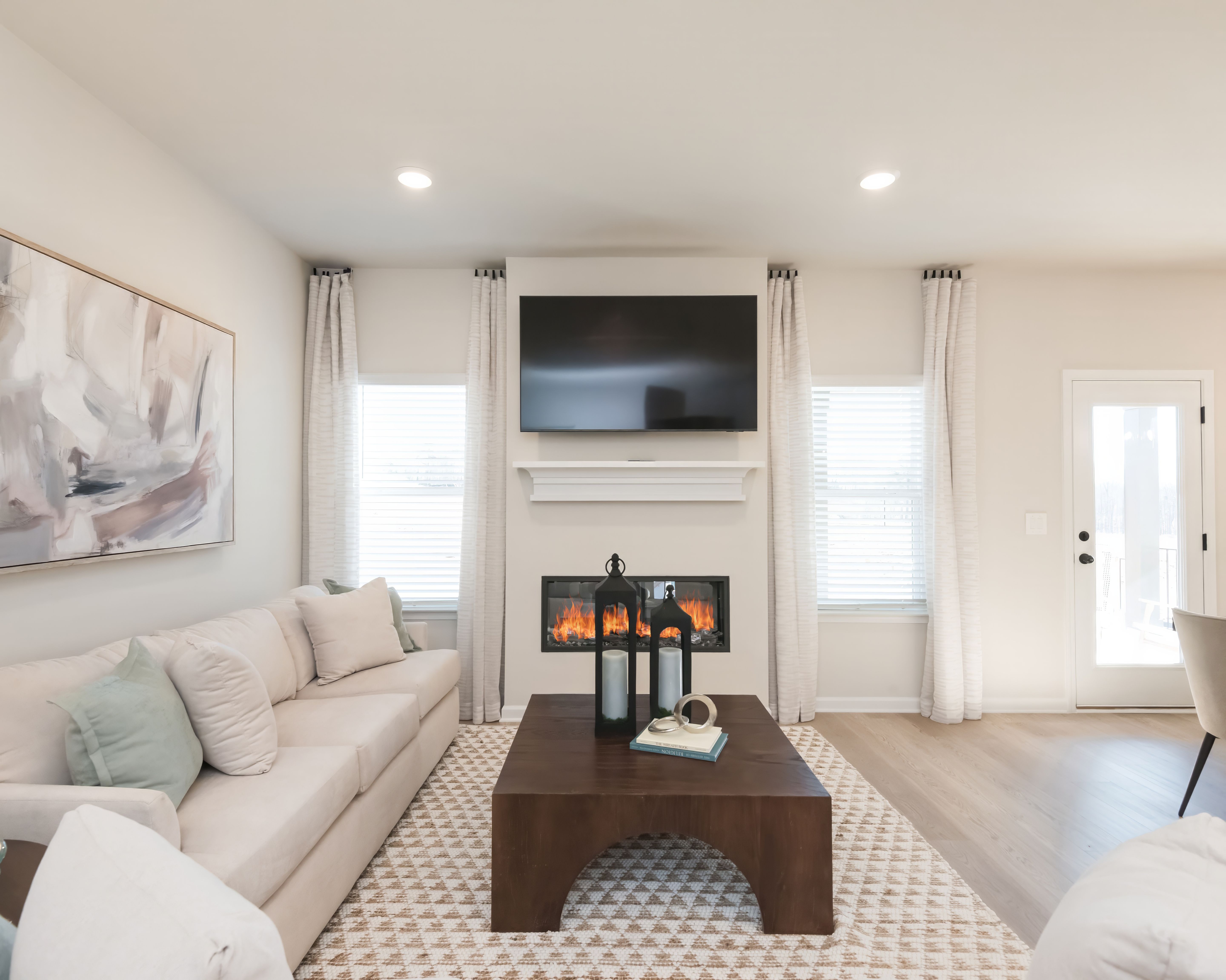 Relax by the fireplace and enjoy a movie night in the living room.
