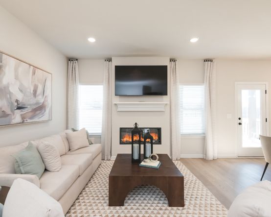 Relax by the fireplace and enjoy a movie night in the living room.