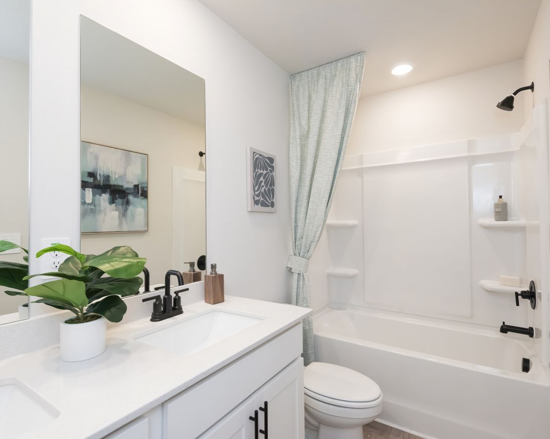 The Chatham floorplan features three secondary bathrooms.
