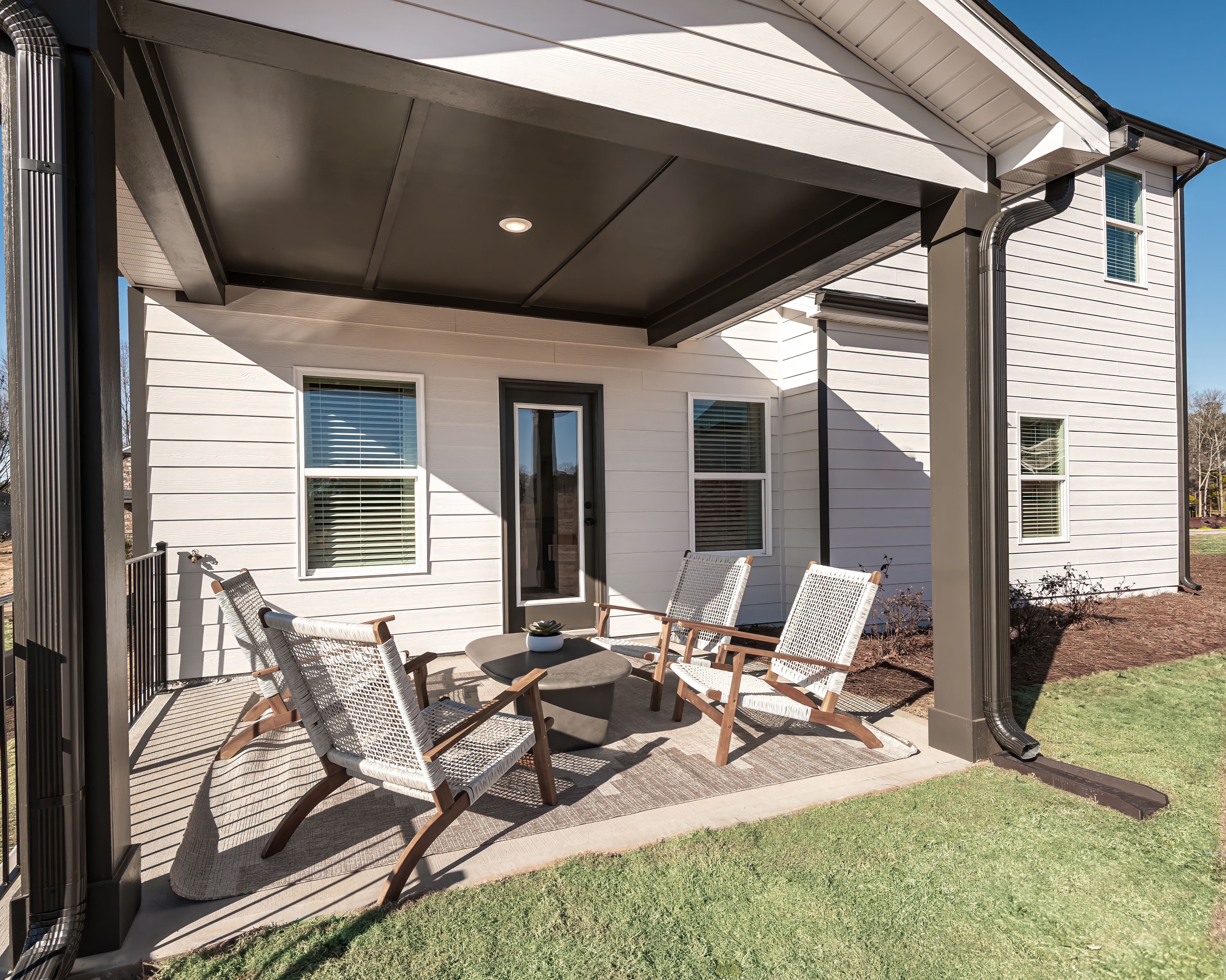 Invite friends and family to grill dinner or enjoy your morning coffee in the private back patio.