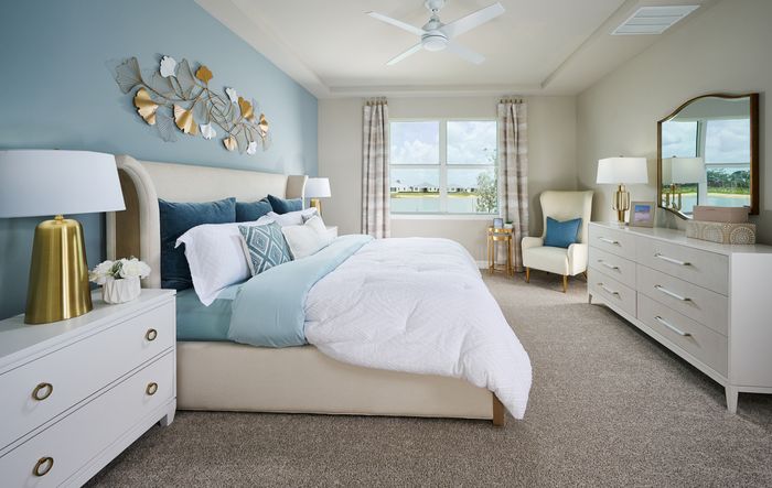 Primary bedroom in the Jay floorplan modeled at Crescent Lakes at Babcock Ranch