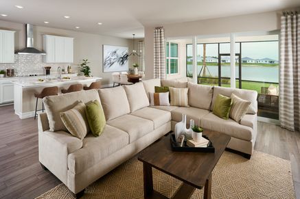 Great room in the Willet floorplan modeled at Crescent Lakes at Babcock Ranch