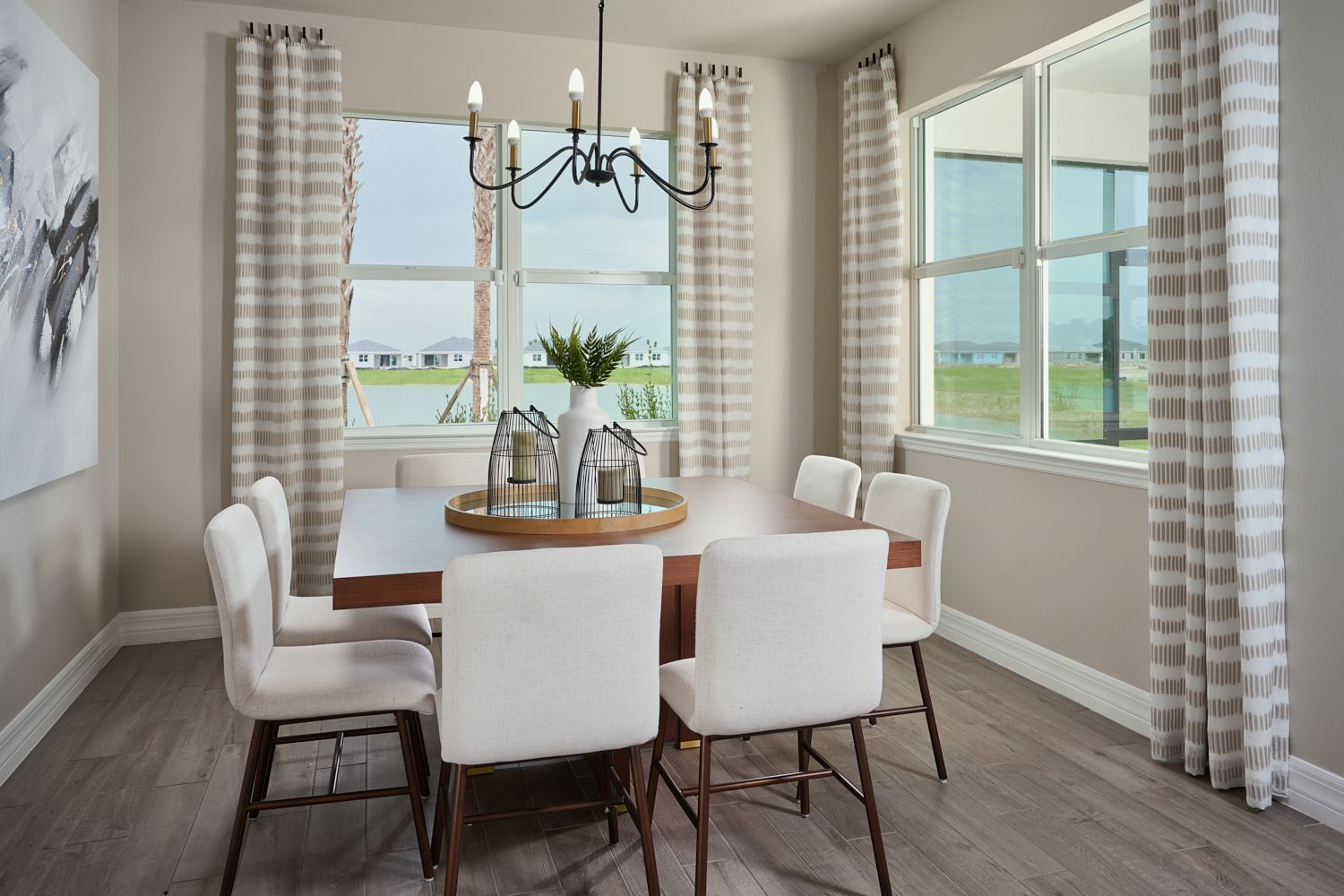 Dining room in the Willet floorplan modeled at Crescent Lakes at Babcock Ranch
