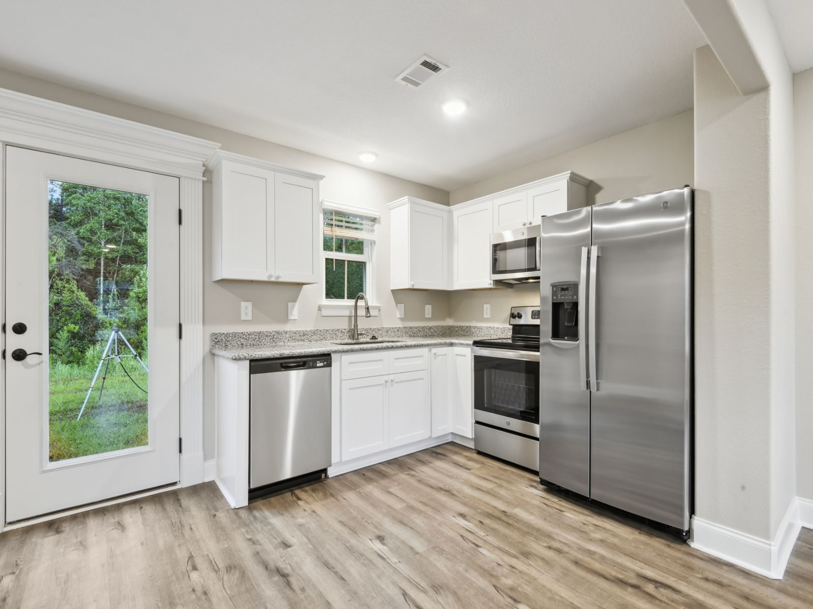 Kitchen in the Parker floorplan at a Meritage Homes community in Gulfport, MS.