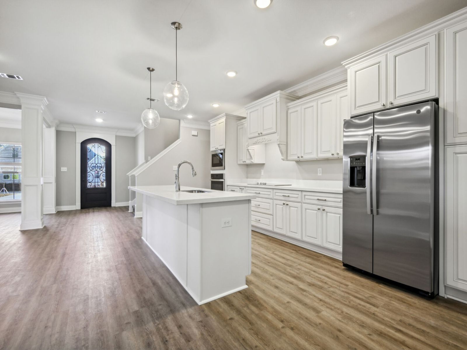 Kitchen in the Elliott floorplan at a Meritage Homes community in Gulfport, MS.